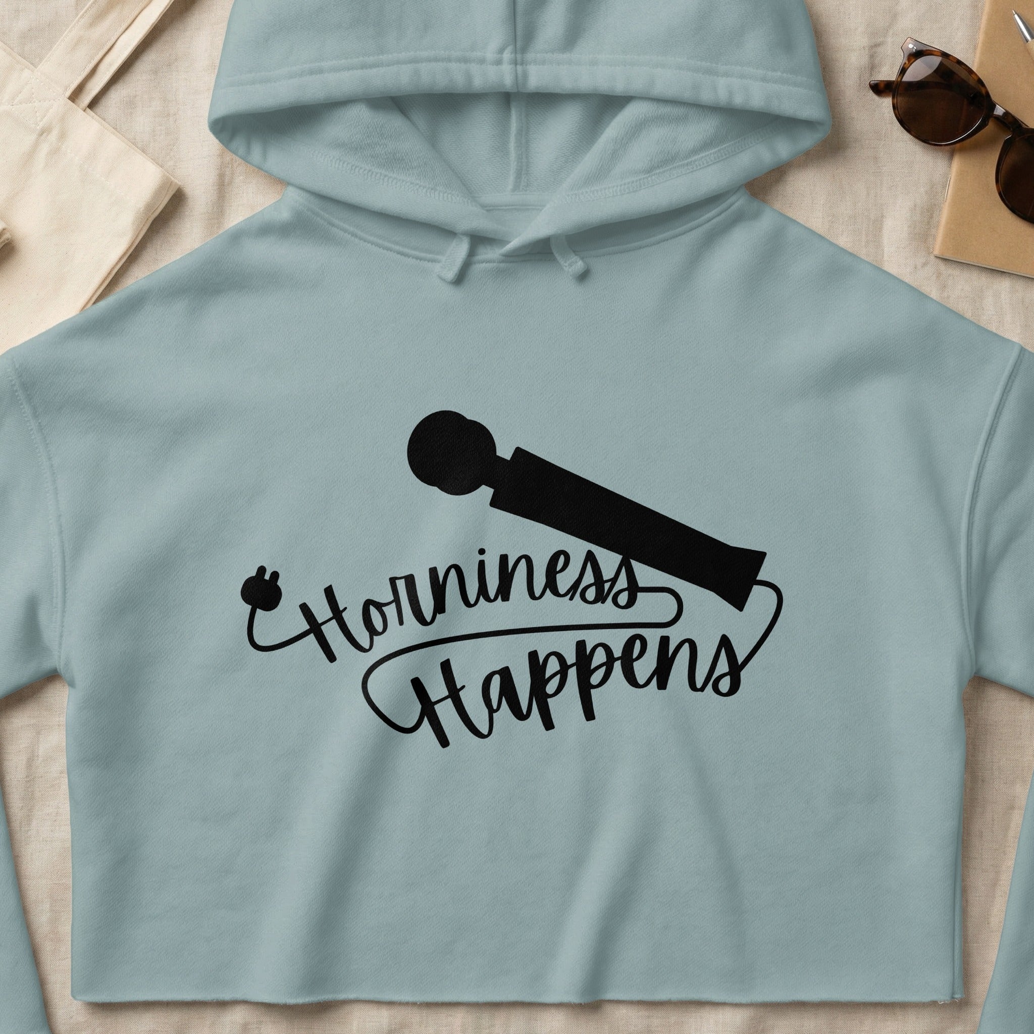 Cropped sweatshirt with "Horniness Happens" text and a vibrating wand graphic.