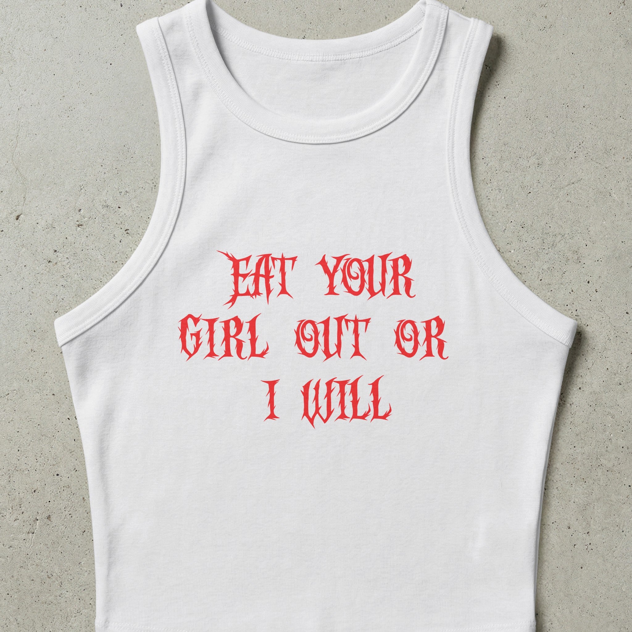 White cropped tank top with red gothic text reading "EAT YOUR GIRL OUT OR I WILL".