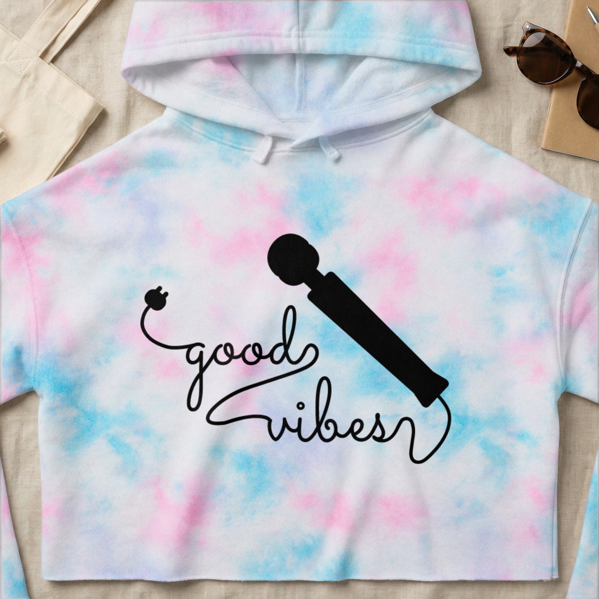 Tie-dye cropped hoodie with "good vibes" text and a black vibrator graphic.