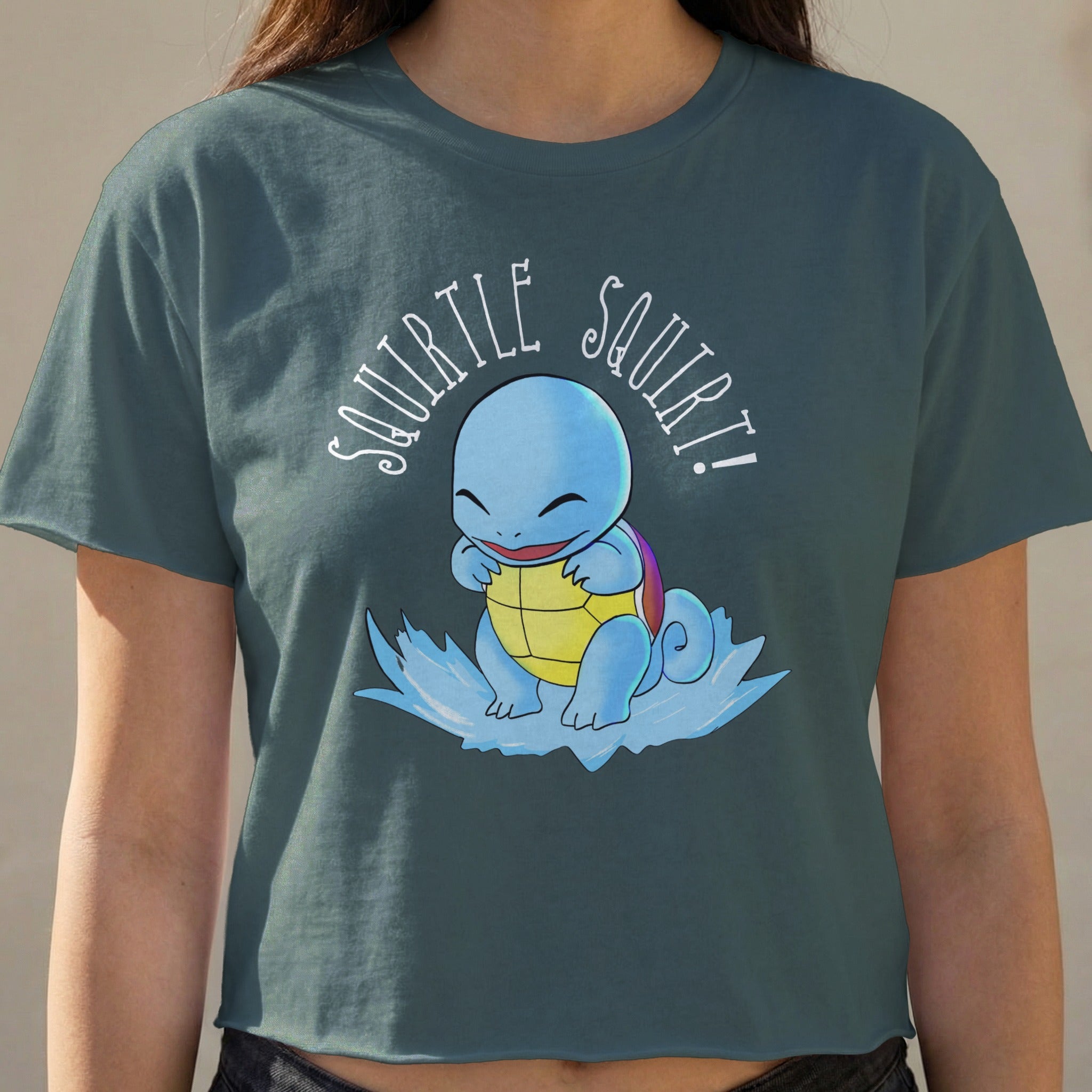 Squirtle from Pokémon smiling and sitting on water, text reads "Squirtle Squirt!".