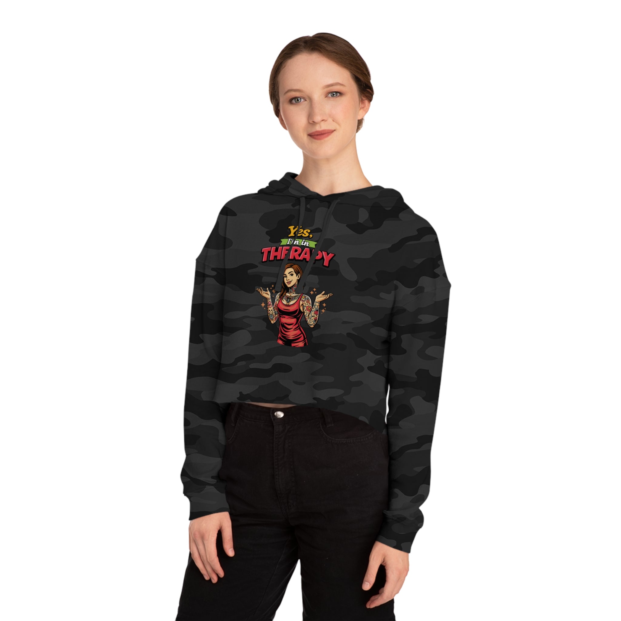 Cropped black camouflage hoodie with "Yes, I'm in therapy" graphic.