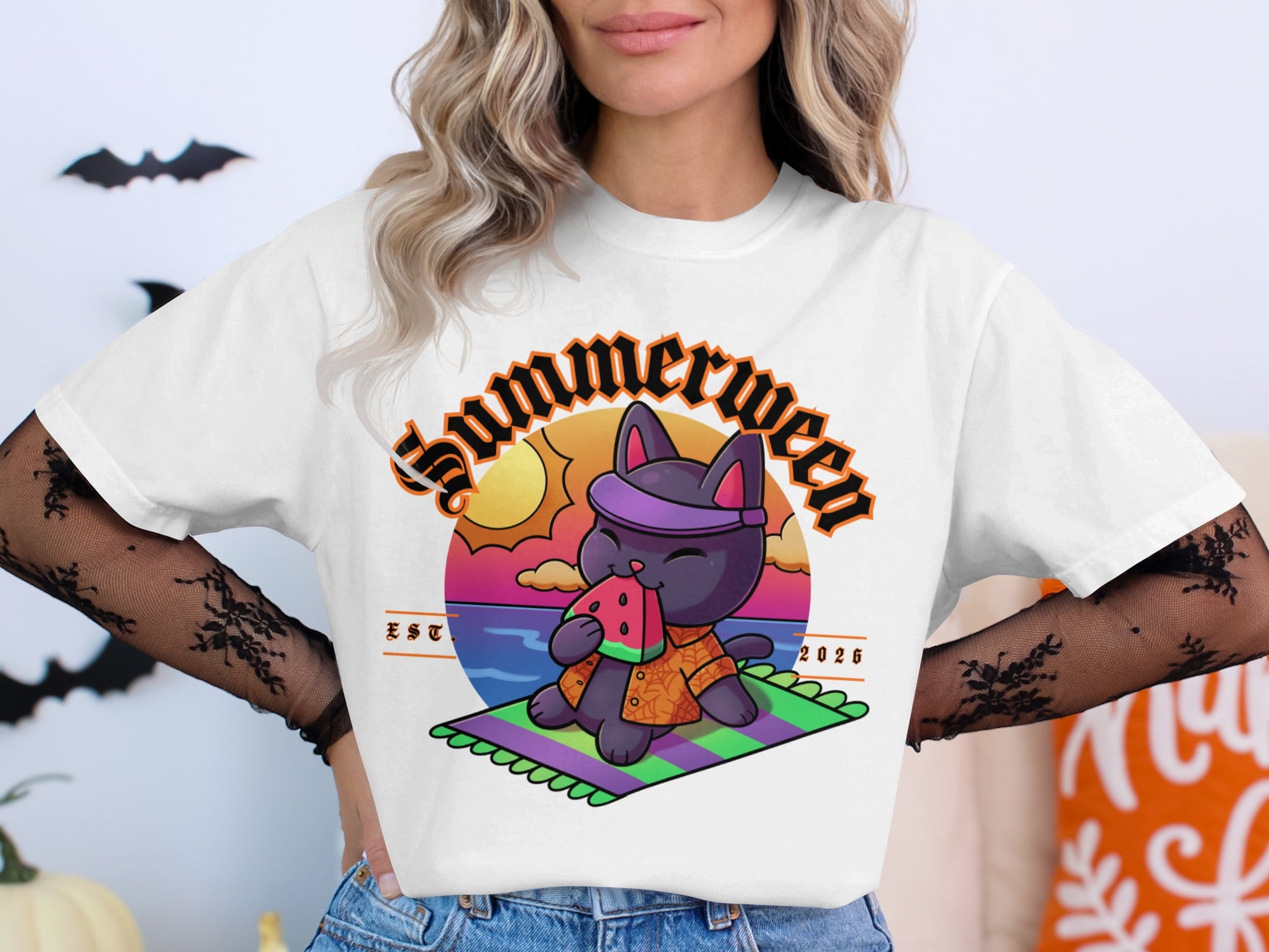 Cartoon black cat eating watermelon on beach with "Summerween Est. 2026" text.