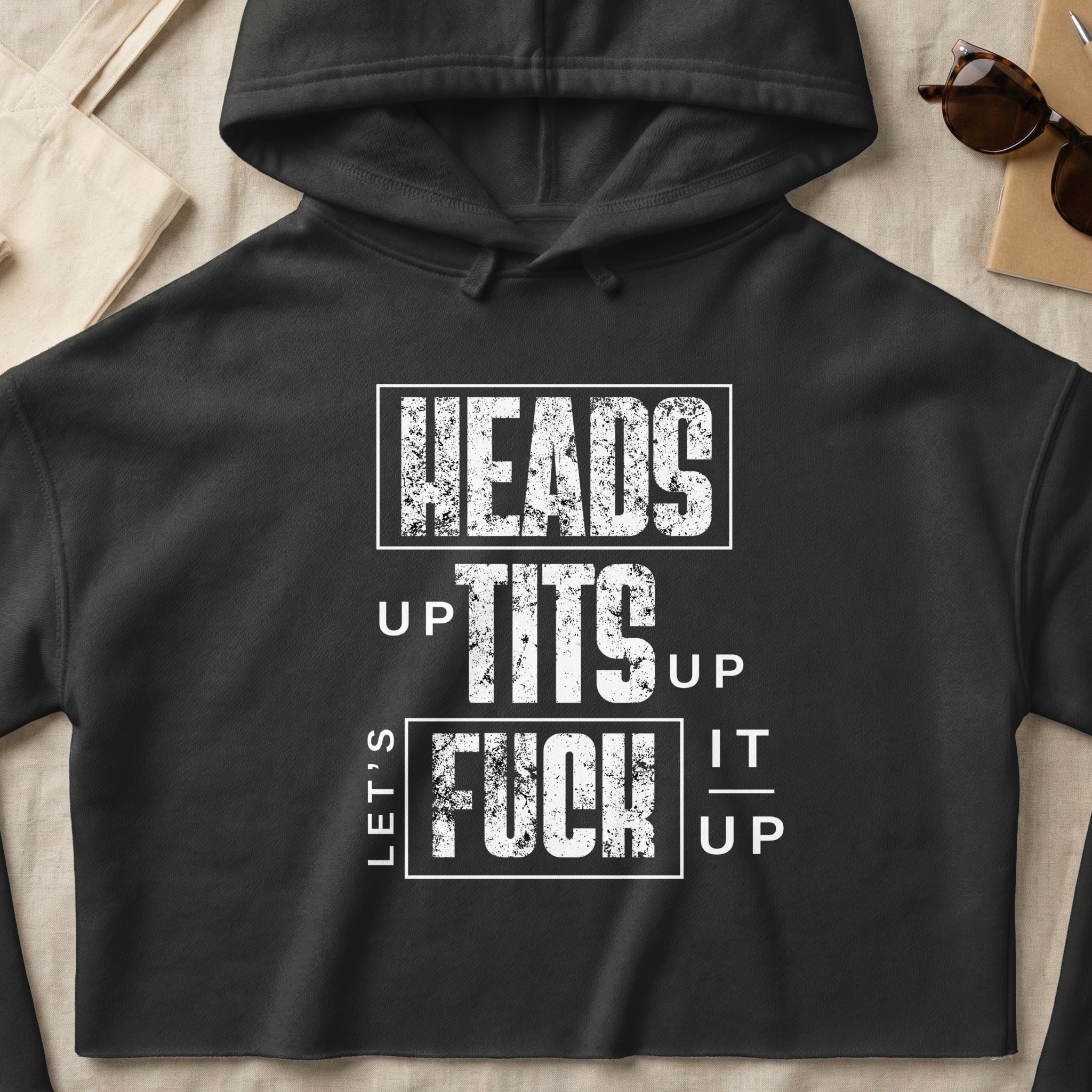 Black hoodie with white text "LET'S UP TITS UP FUCK IT UP".