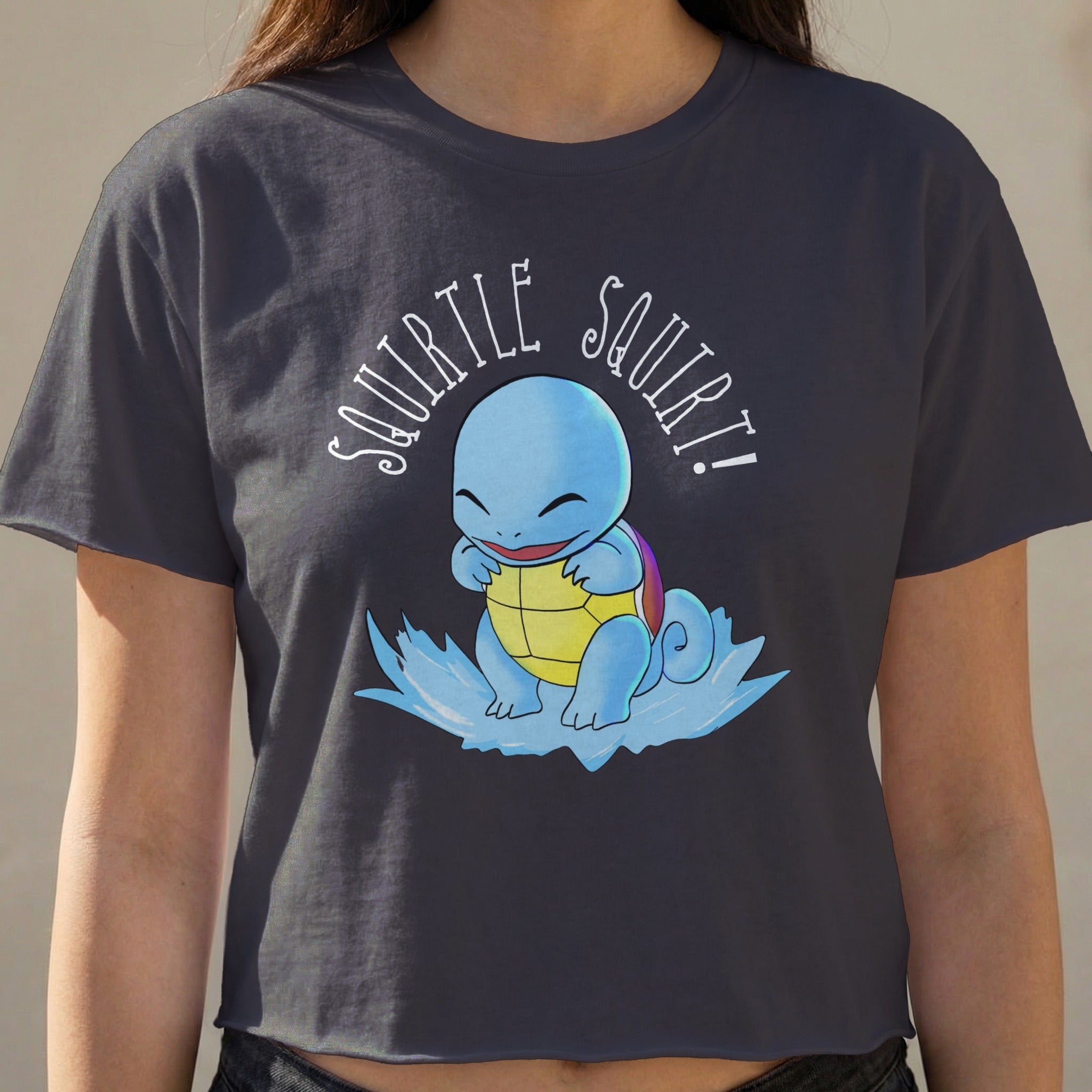 Squirtle graphic on a dark grey crop top t-shirt.