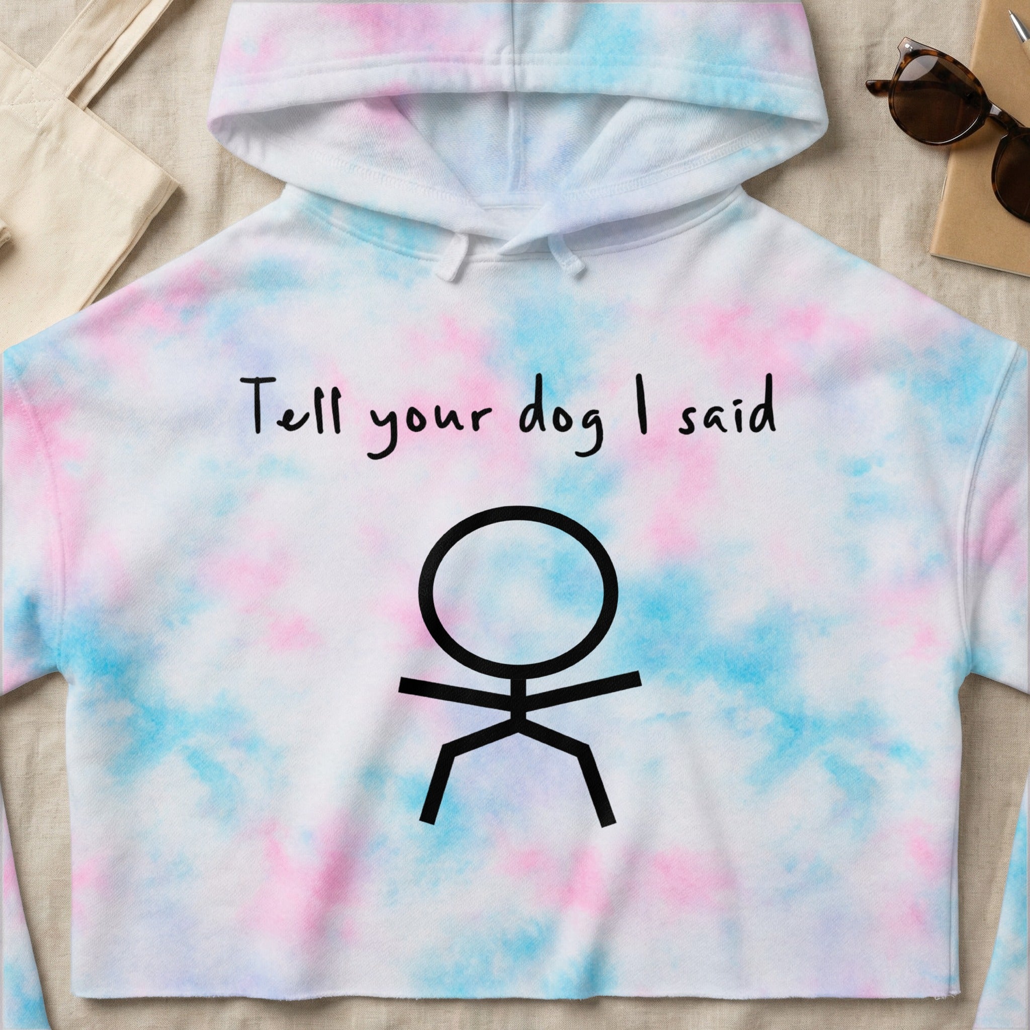 Cropped tie-dye hoodie with stick figure and text "Tell your dog I said".
