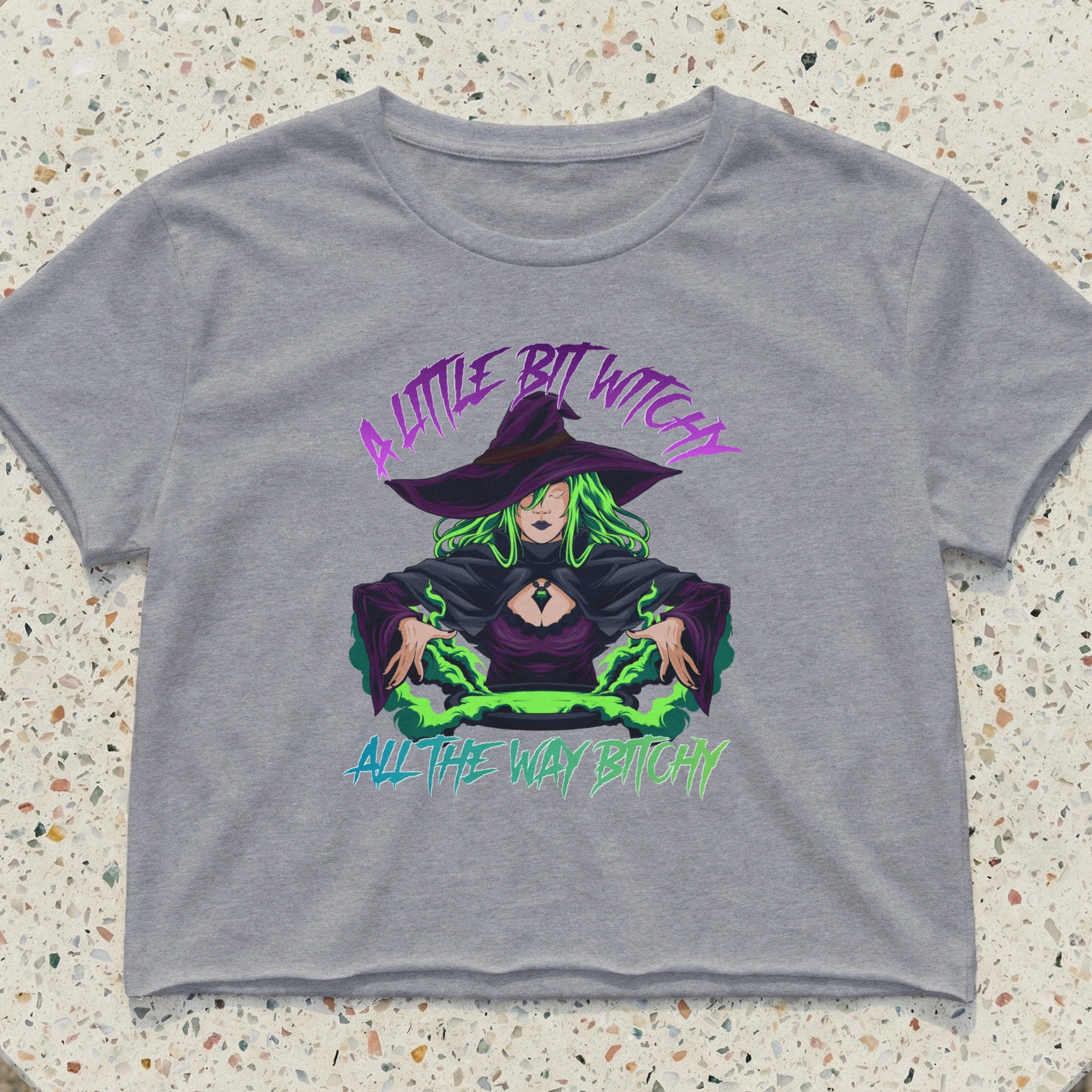 Grey cropped t-shirt featuring a witch illustration and text.