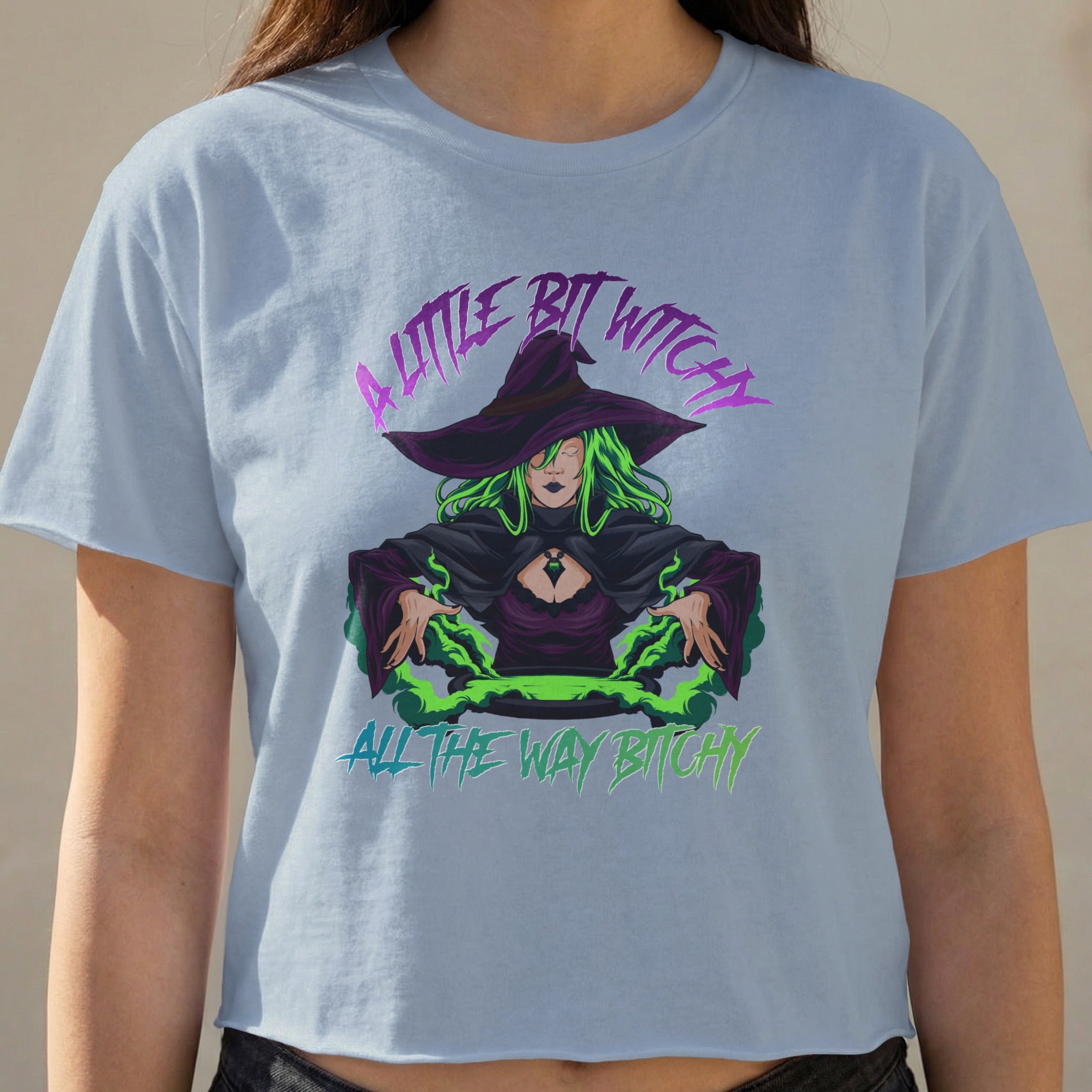 Witch in green costume, "A little bit witchy" and "All the way bitchy" text.