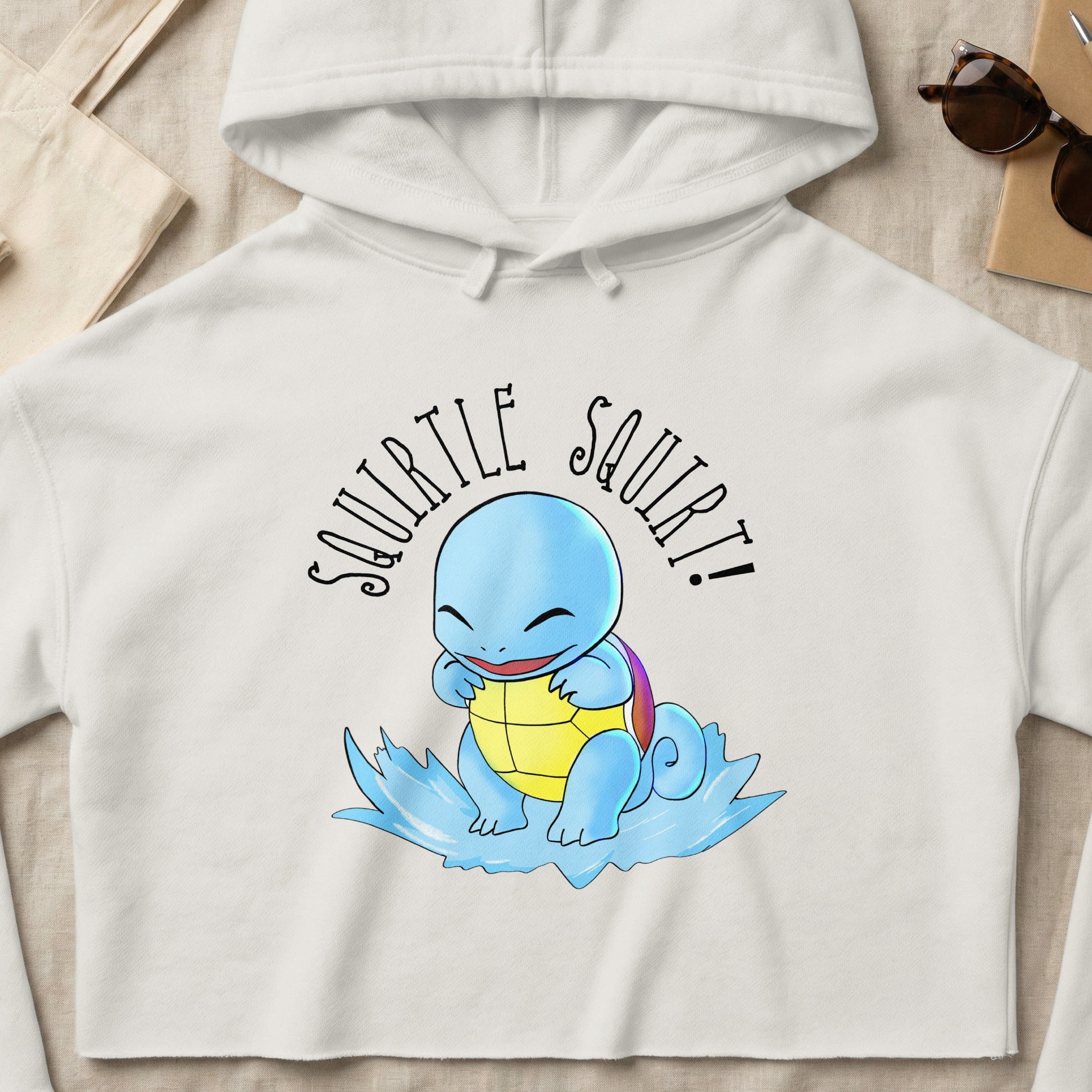 Squirtle in a shell, splashing in water, with "Squirtle Squirt!" text.