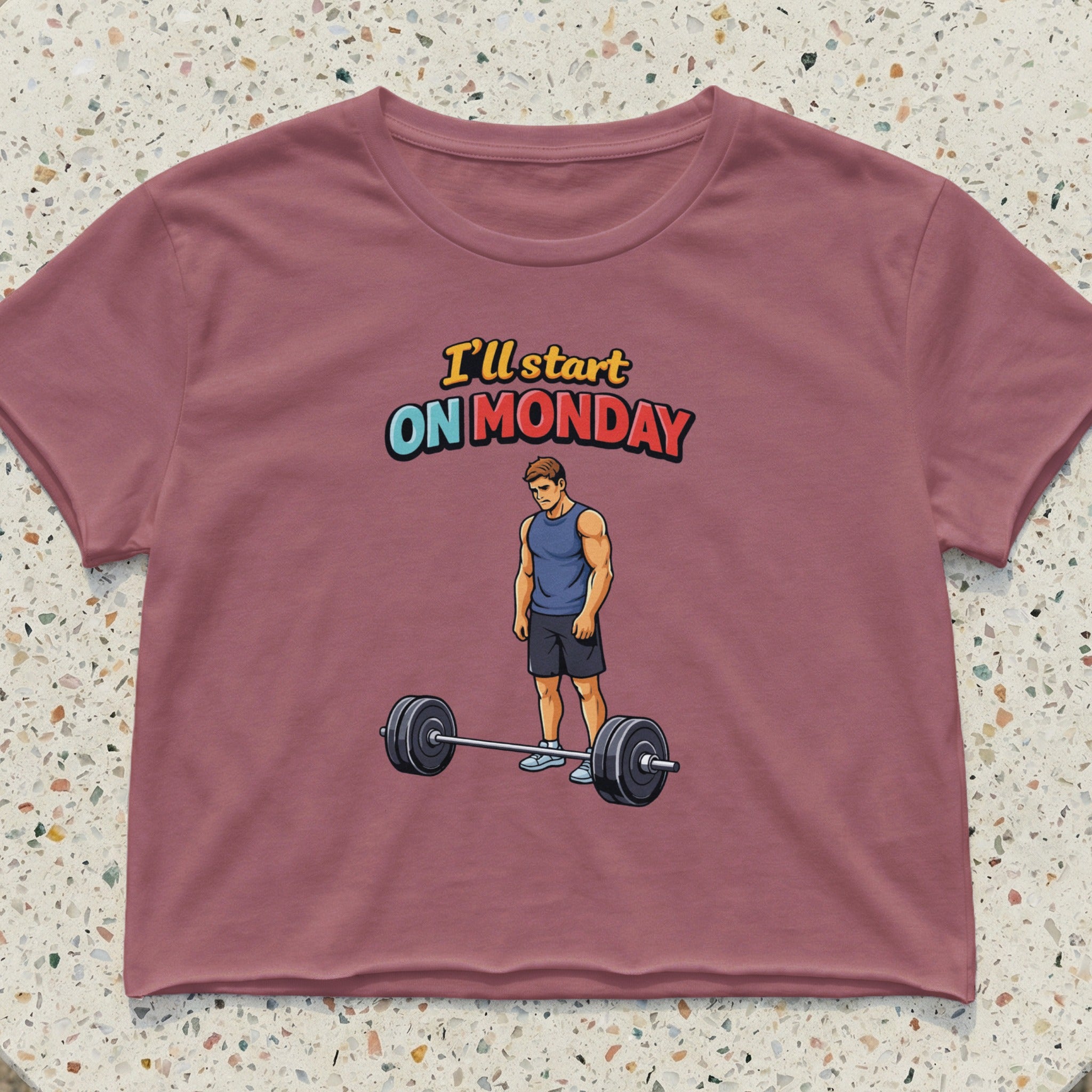 Cropped t-shirt with "I'll start on Monday" text and a man lifting weights.