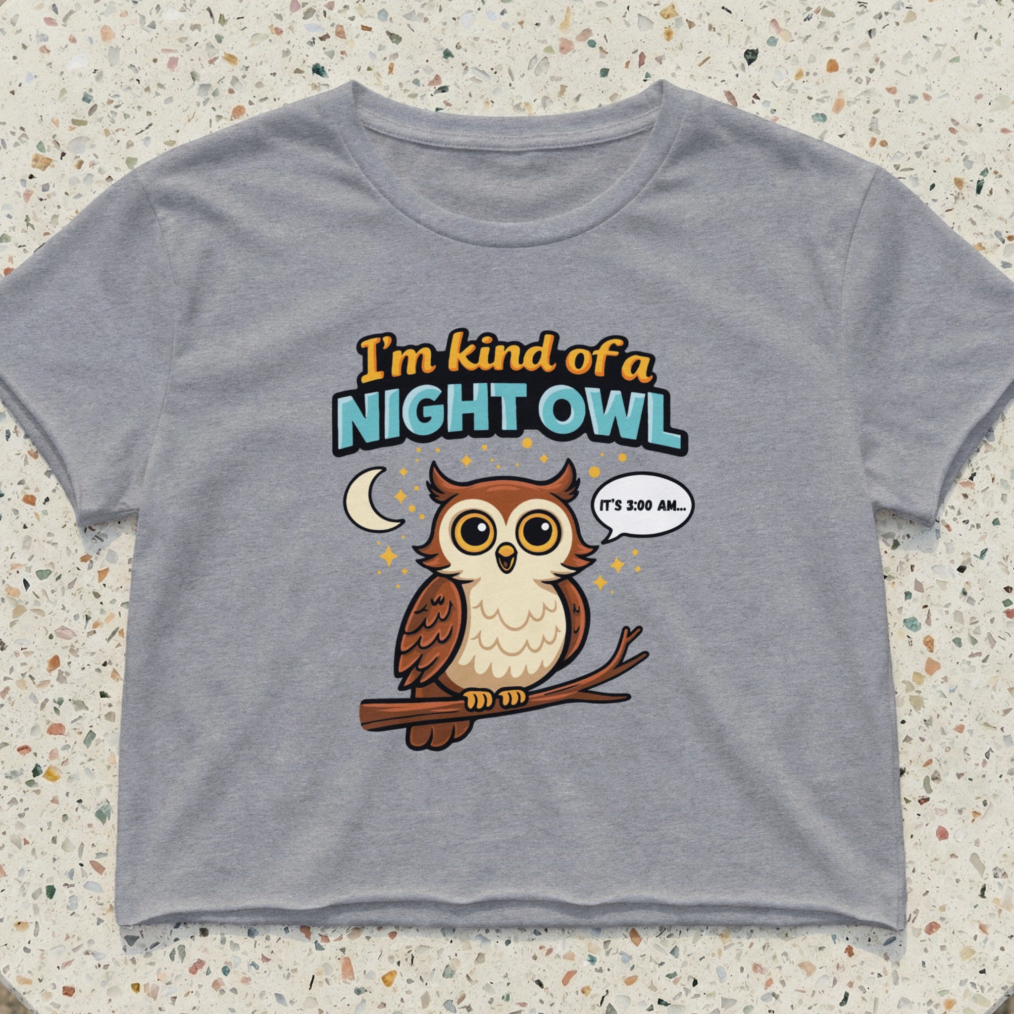 Gray cropped t-shirt with cartoon owl and "I'm kind of a night owl" speech bubble.