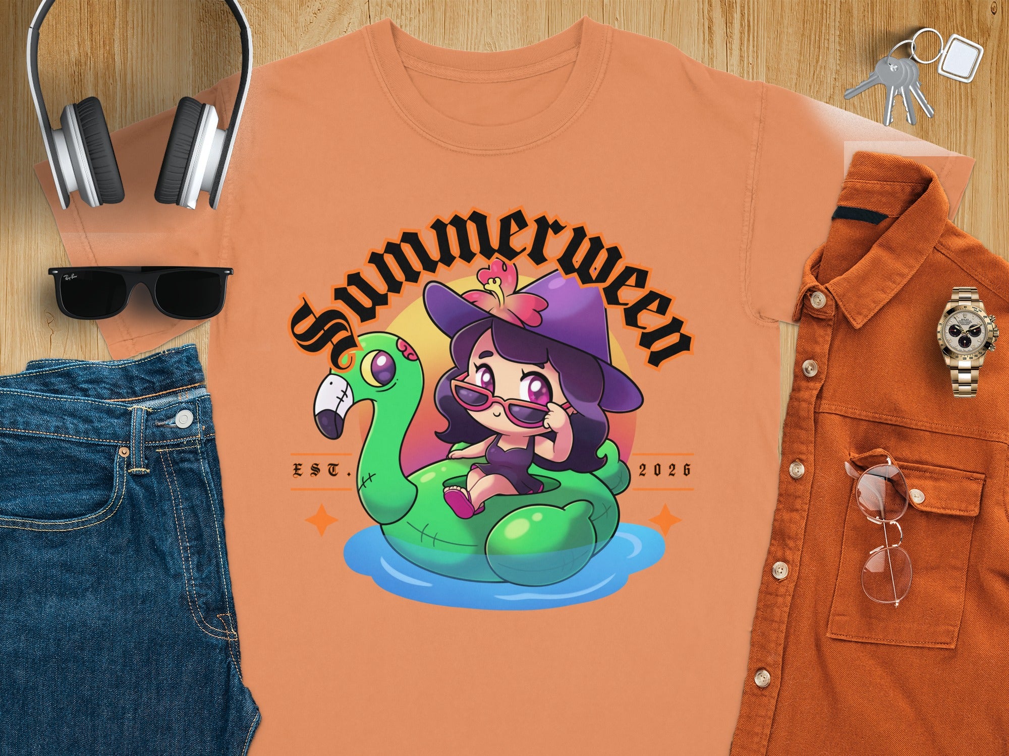 Chibi witch on flamingo float with "Summerween Est. 2026" text.