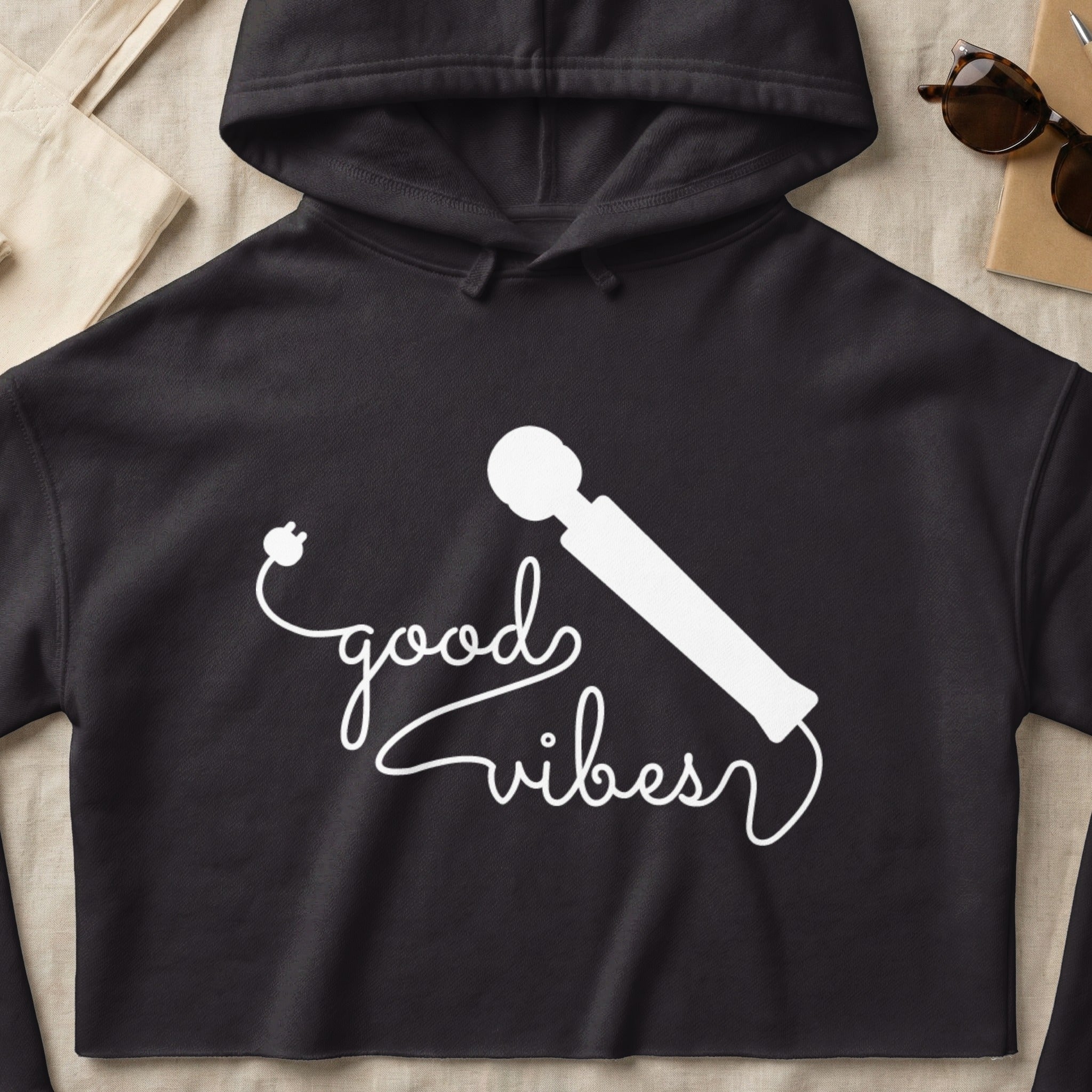 Black hoodie with "good vibes" text and a white vibrator graphic.