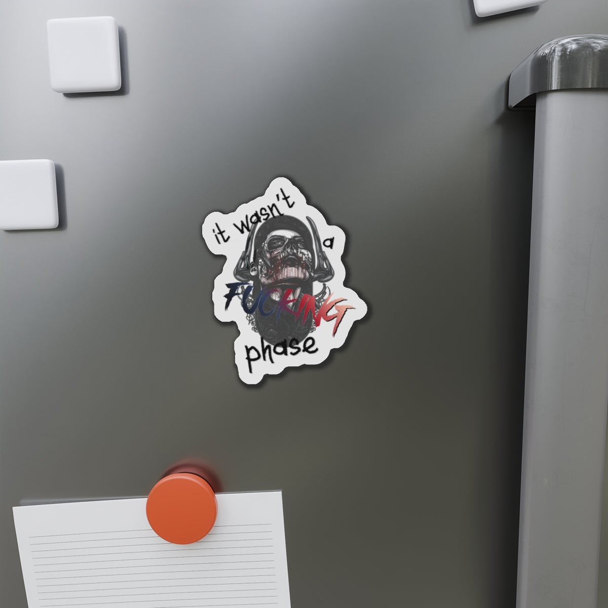 Magnet featuring a skull with "it wasn't a fucking phase" text.