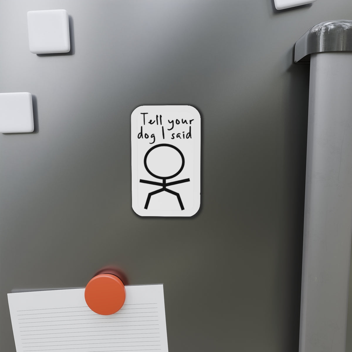 "Tell your dog I said" text above a stick figure on a white rectangle magnet.