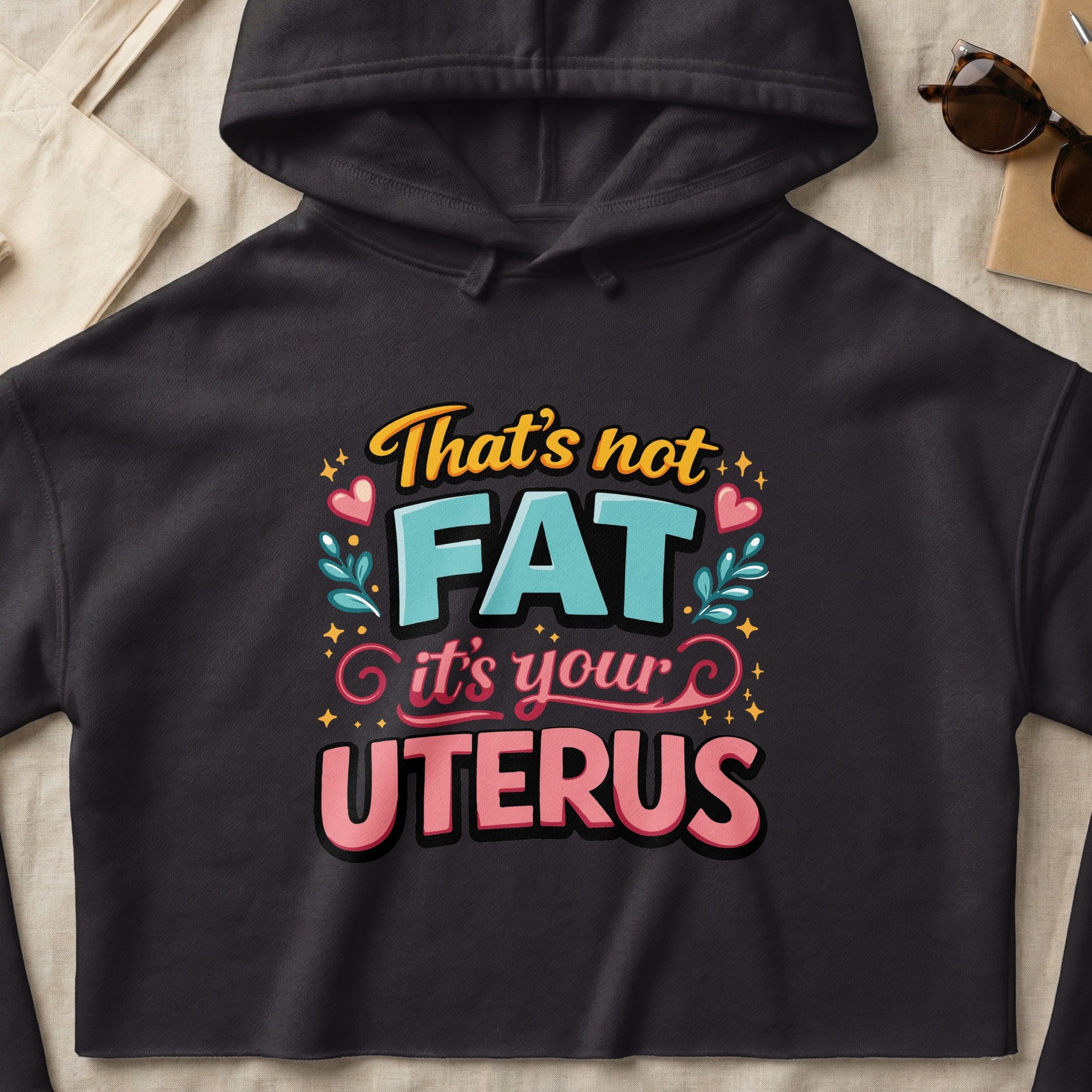 Black hoodie with text: That's not FAT it's your UTERUS.