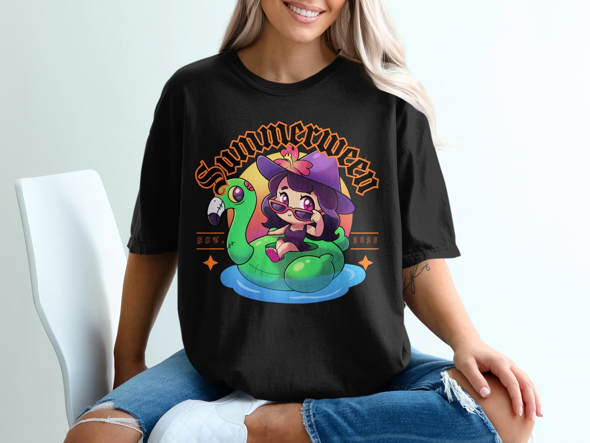 Black t-shirt with cartoon girl on flamingo float, "Summer Queen" text.