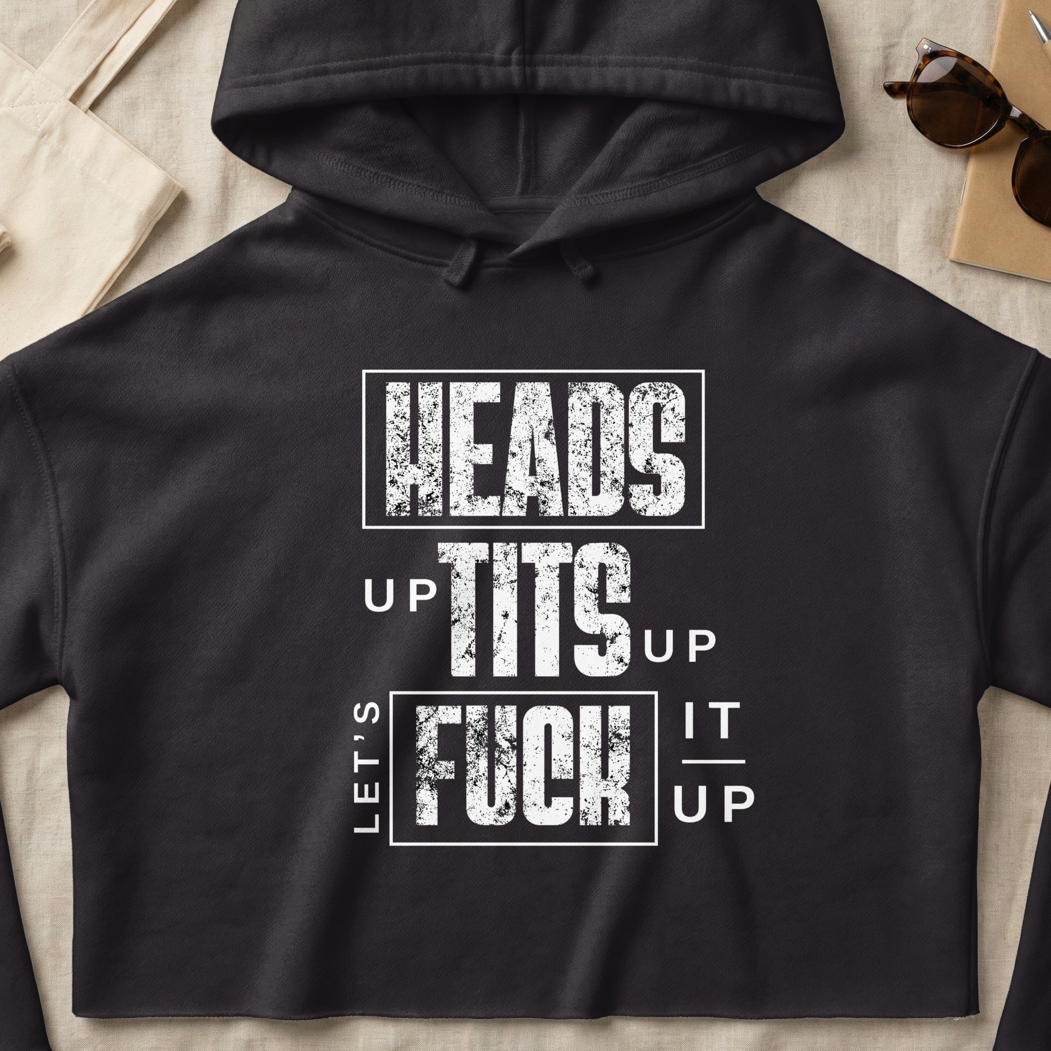 Black hoodie with "LET'S TITS UP FUCK IT UP" graphic print.