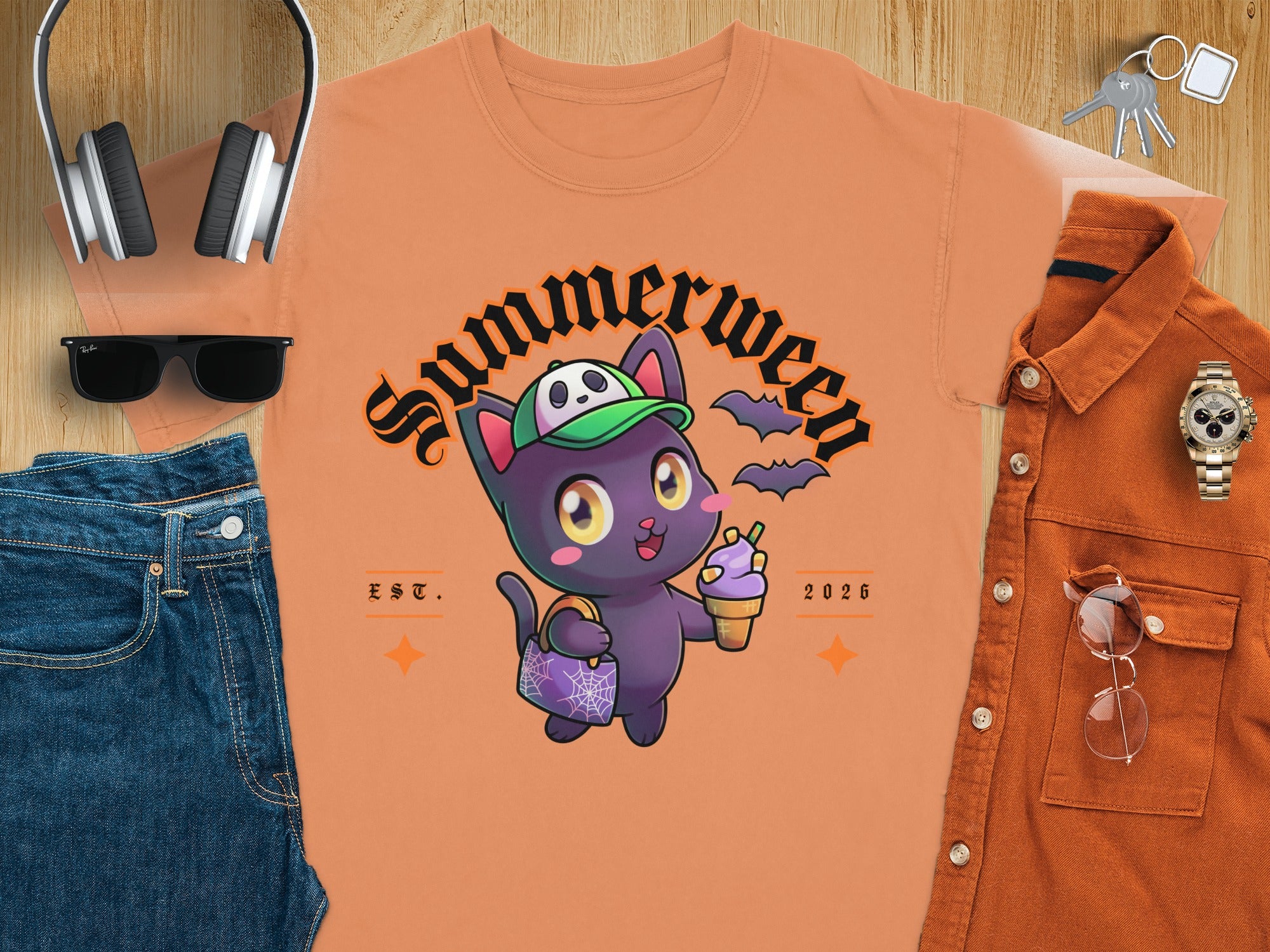 Orange t-shirt with "Summerween" text, black cat with ice cream, and bats.