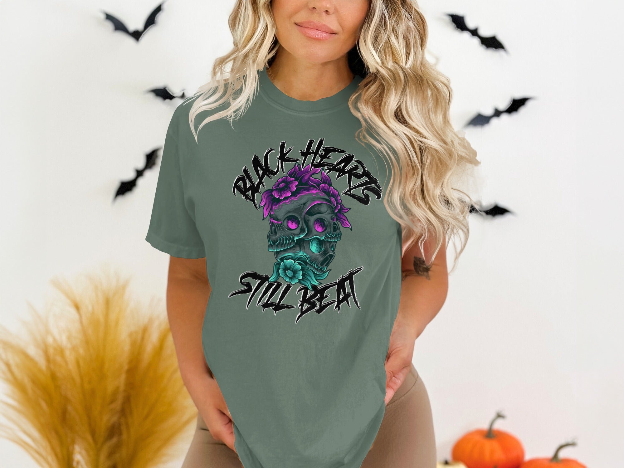 T-shirt with floral skull graphic and "Black Hearts Still Beat" text.