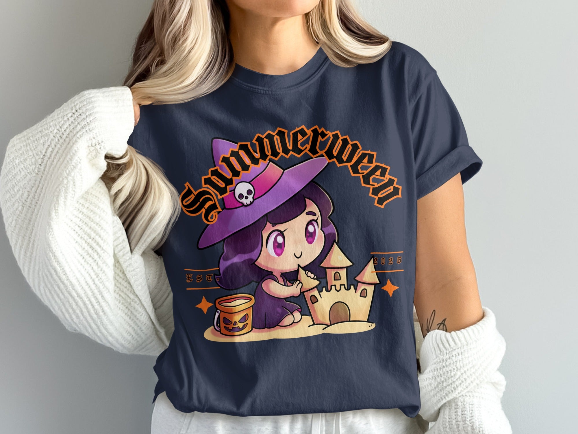 Chibi witch builds sandcastle with pumpkin bucket and "Summerween" text.