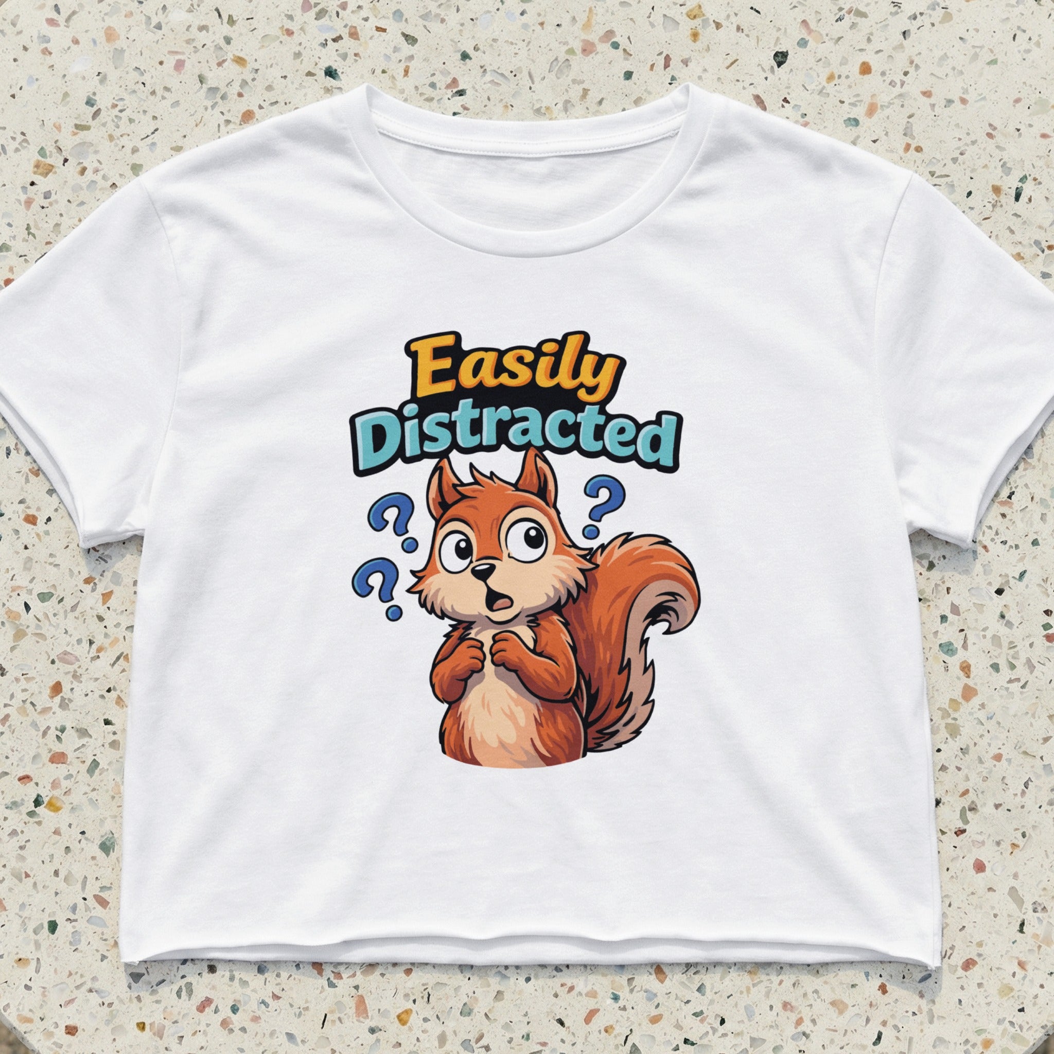 T-shirt with a cartoon squirrel and the text "Easily Distracted".