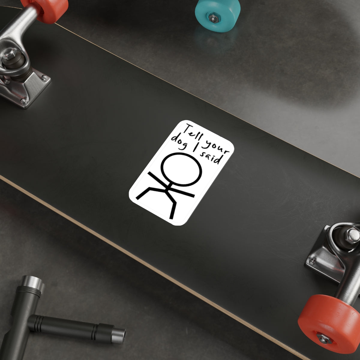 Sticker with a stick figure and text "Tell your dog I said".