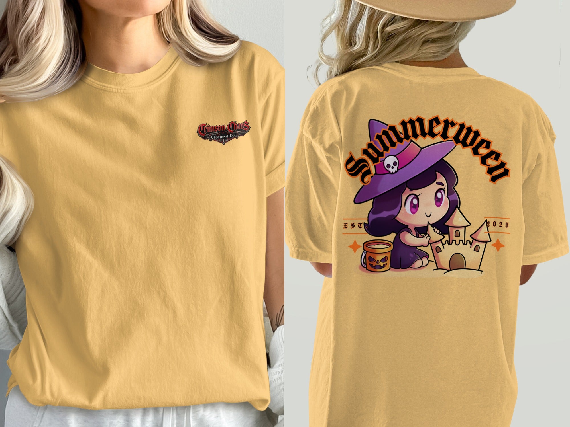 Yellow t-shirt with a small logo on the left chest and a cartoon witch building a sandcastle on the back.