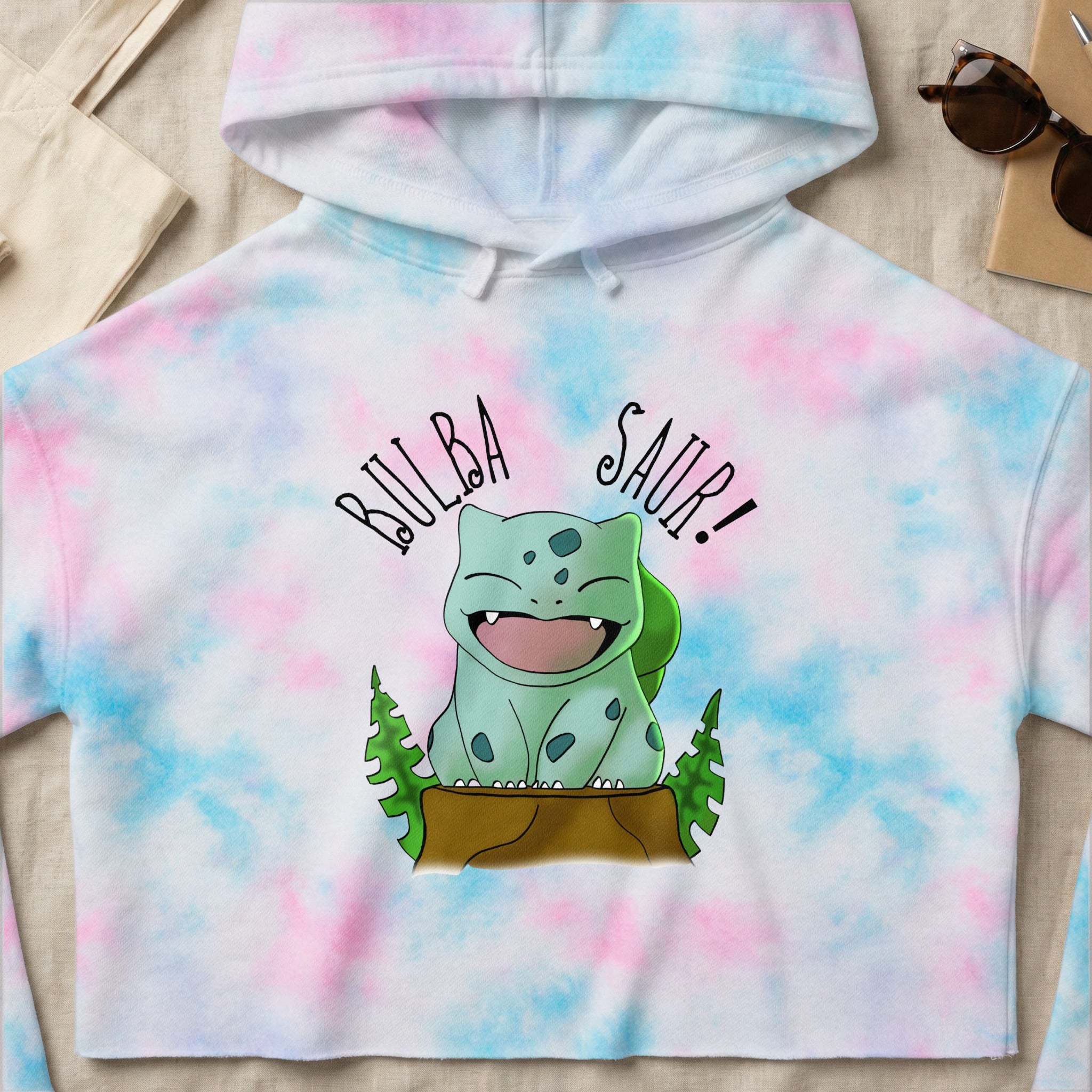Bulbasaur in tie-dye hoodie with "Bulbasaur!" text.