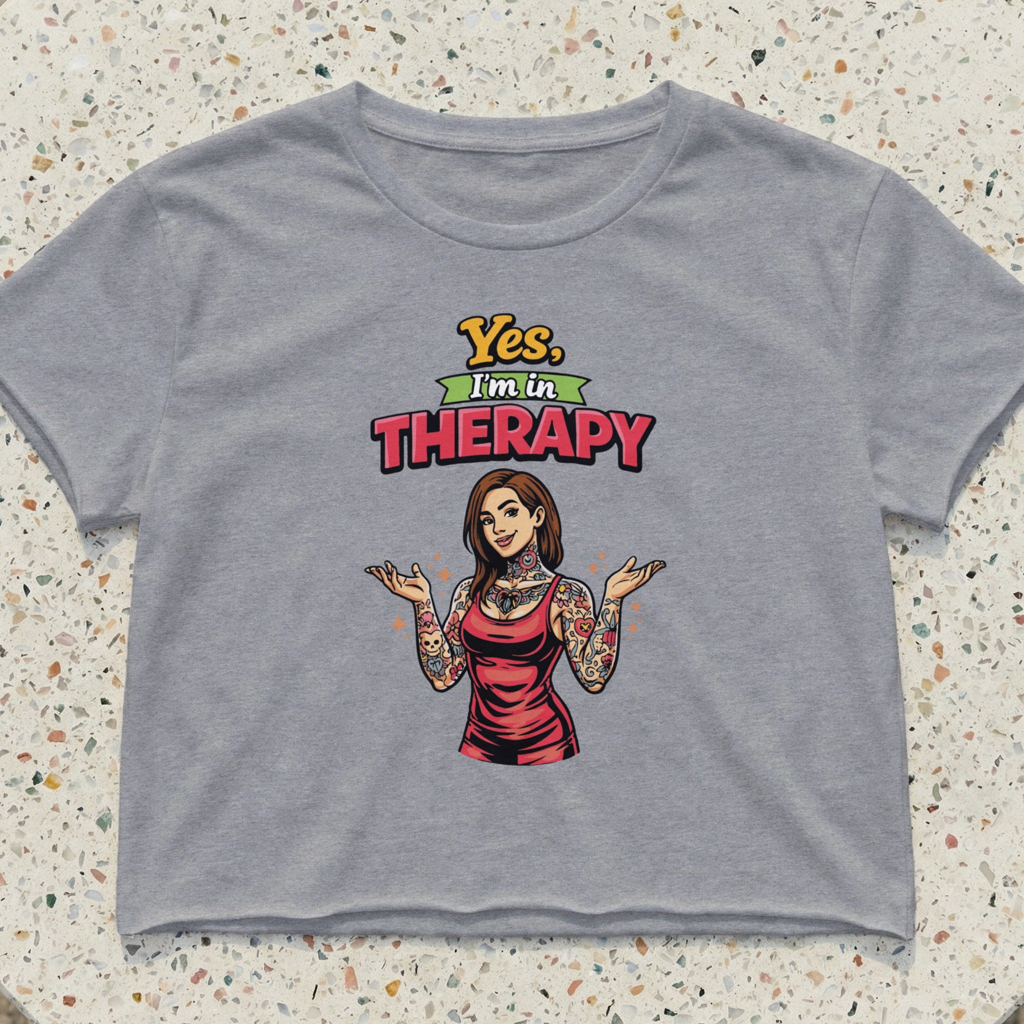 Woman with tattoos wearing red dress and crop top, "Yes, I'm in THERAPY" text.