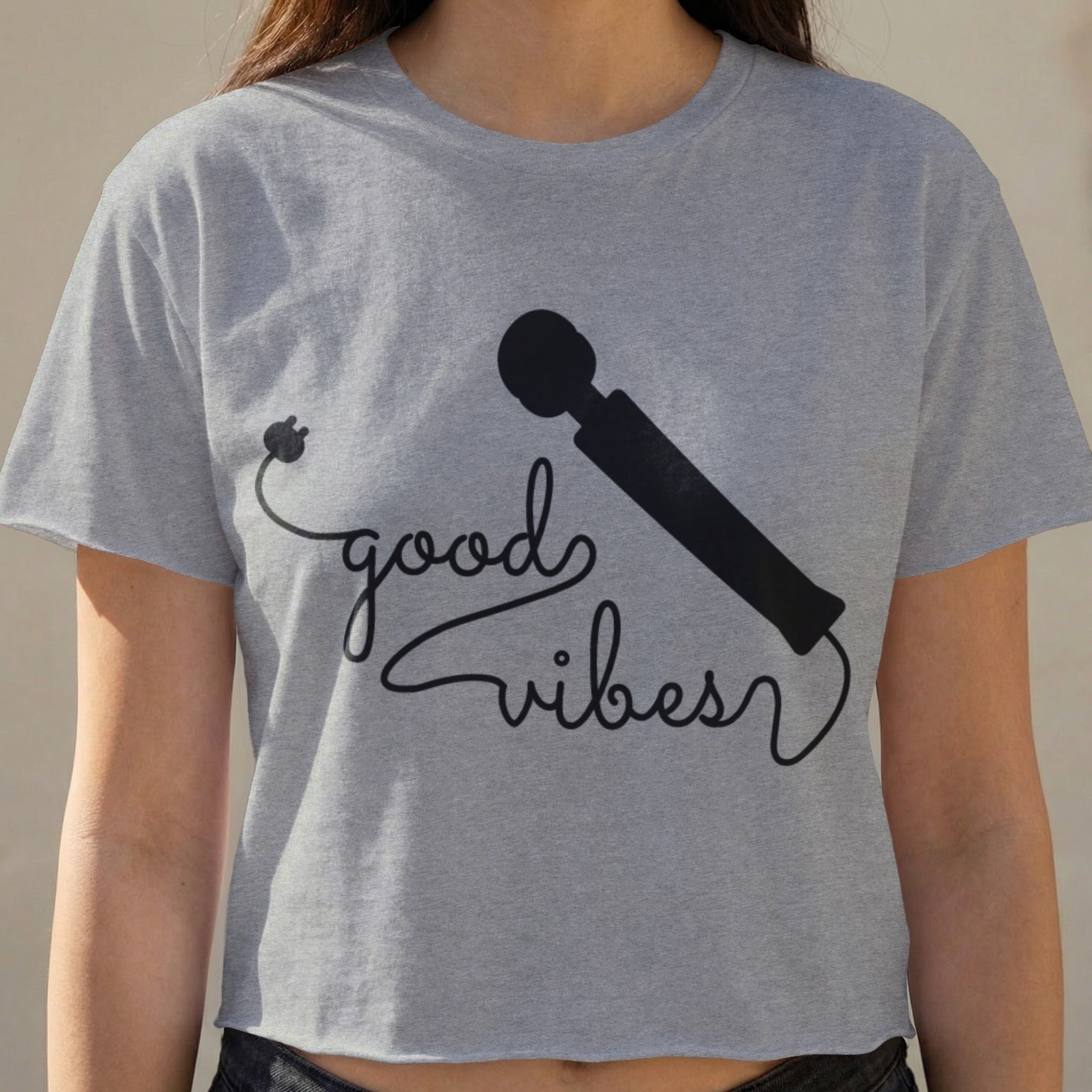Grey crop top with black "good vibes" text and a vibrator graphic.