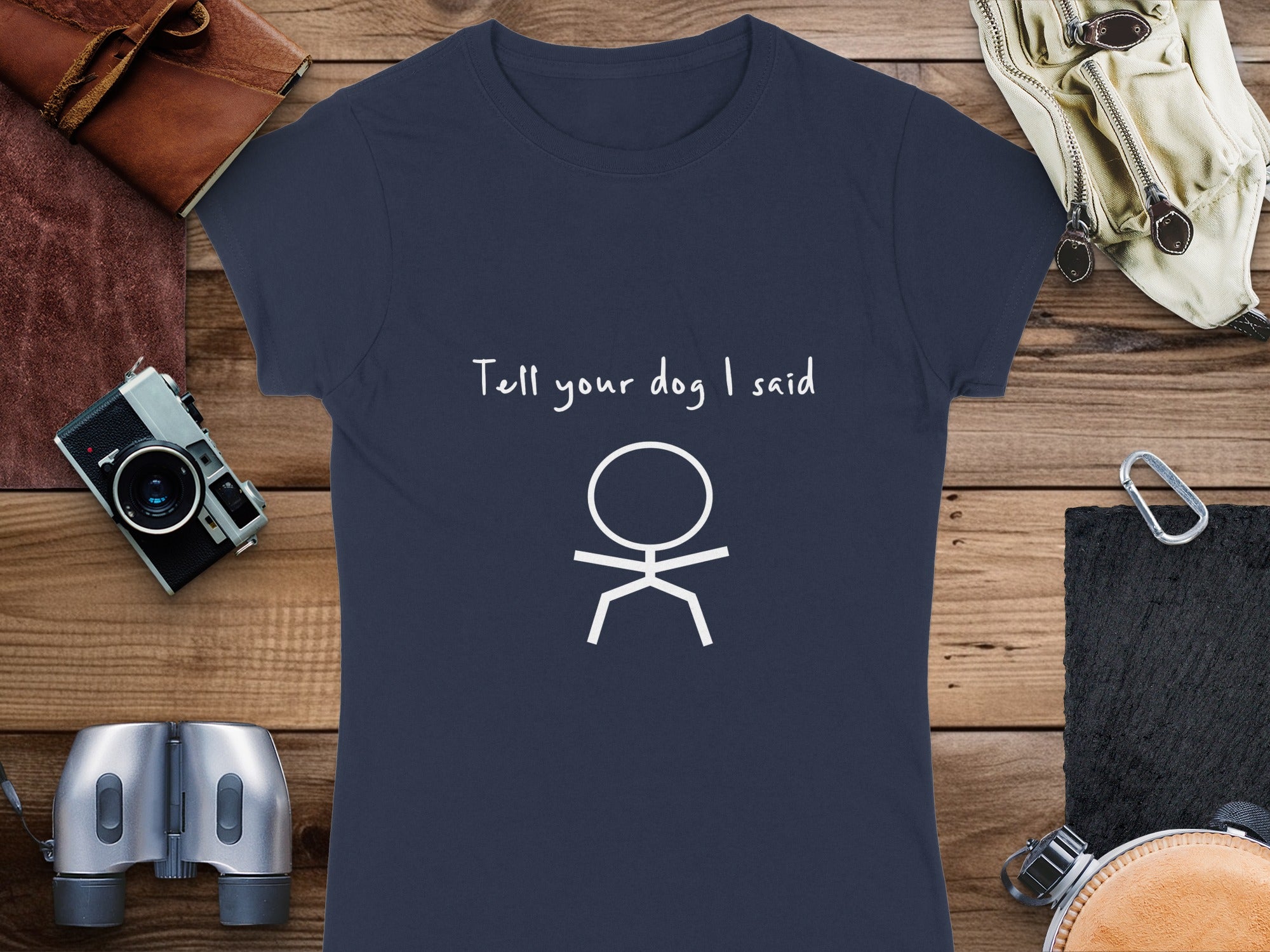Navy t-shirt with white stick figure and text "Tell your dog I said".