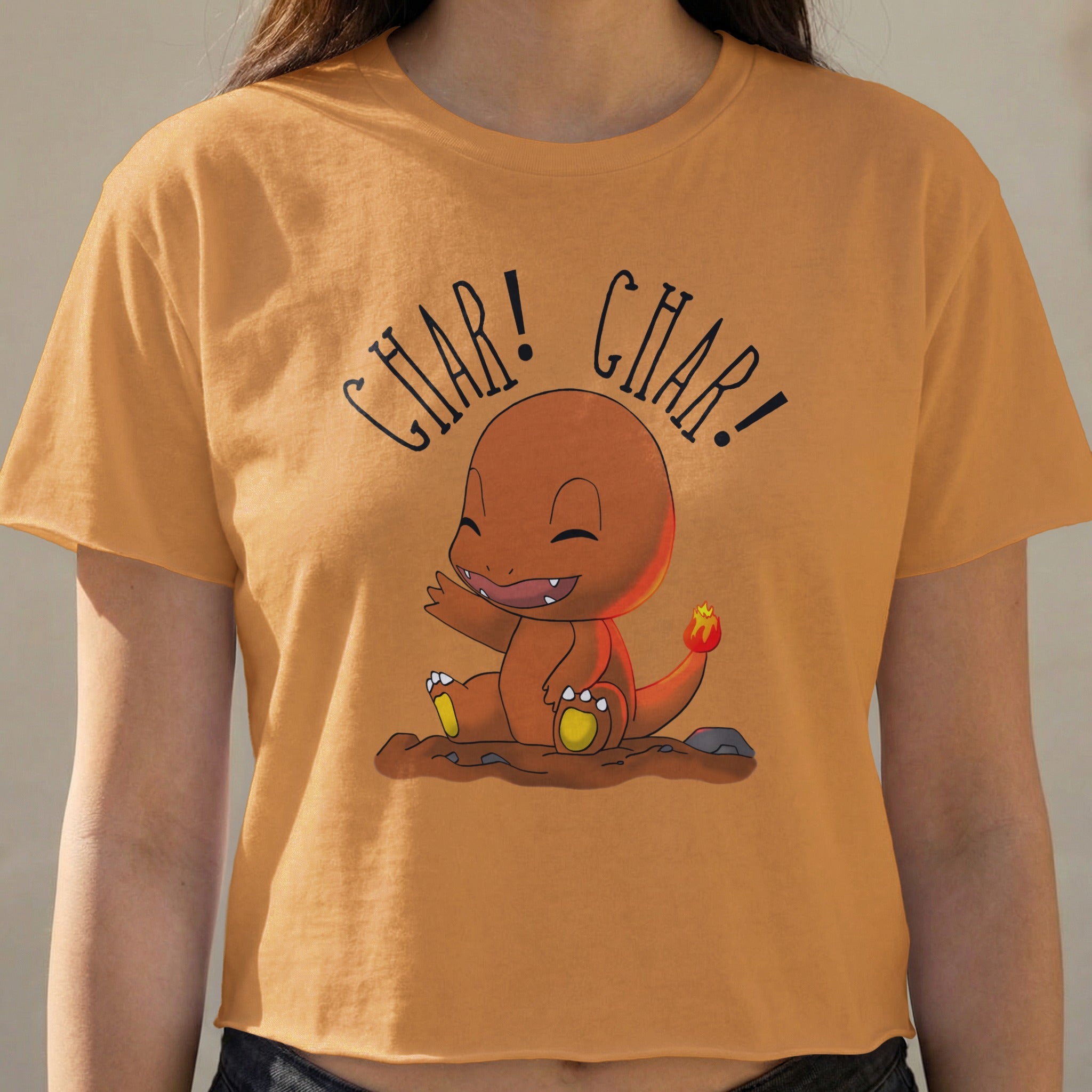 Orange t-shirt with Charmander character and "Char! Char!" text.