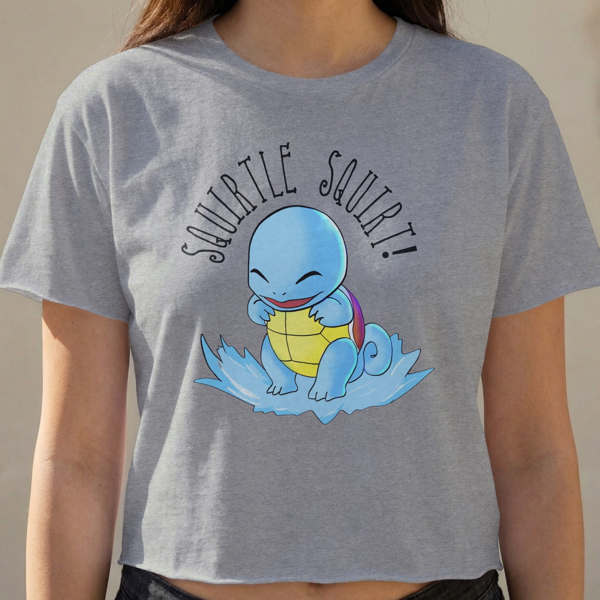 Squirtle character with "Squirtle Squirt!" text on a gray crop top.