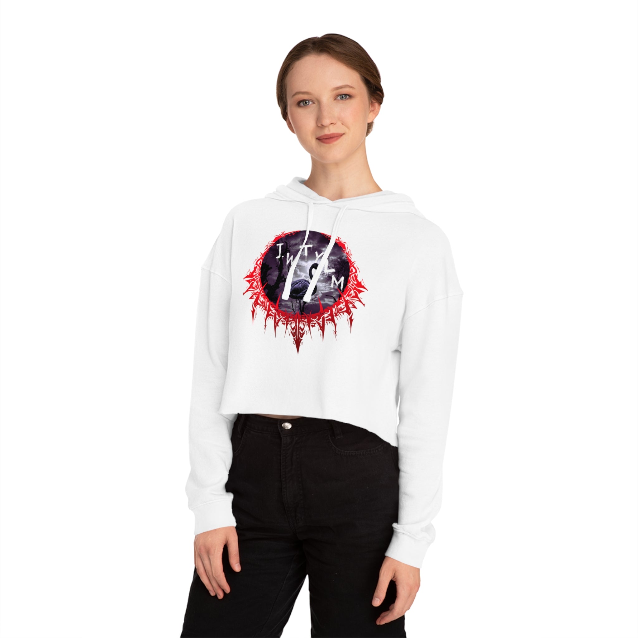 Woman wearing white cropped hoodie with red and black graphic logo.