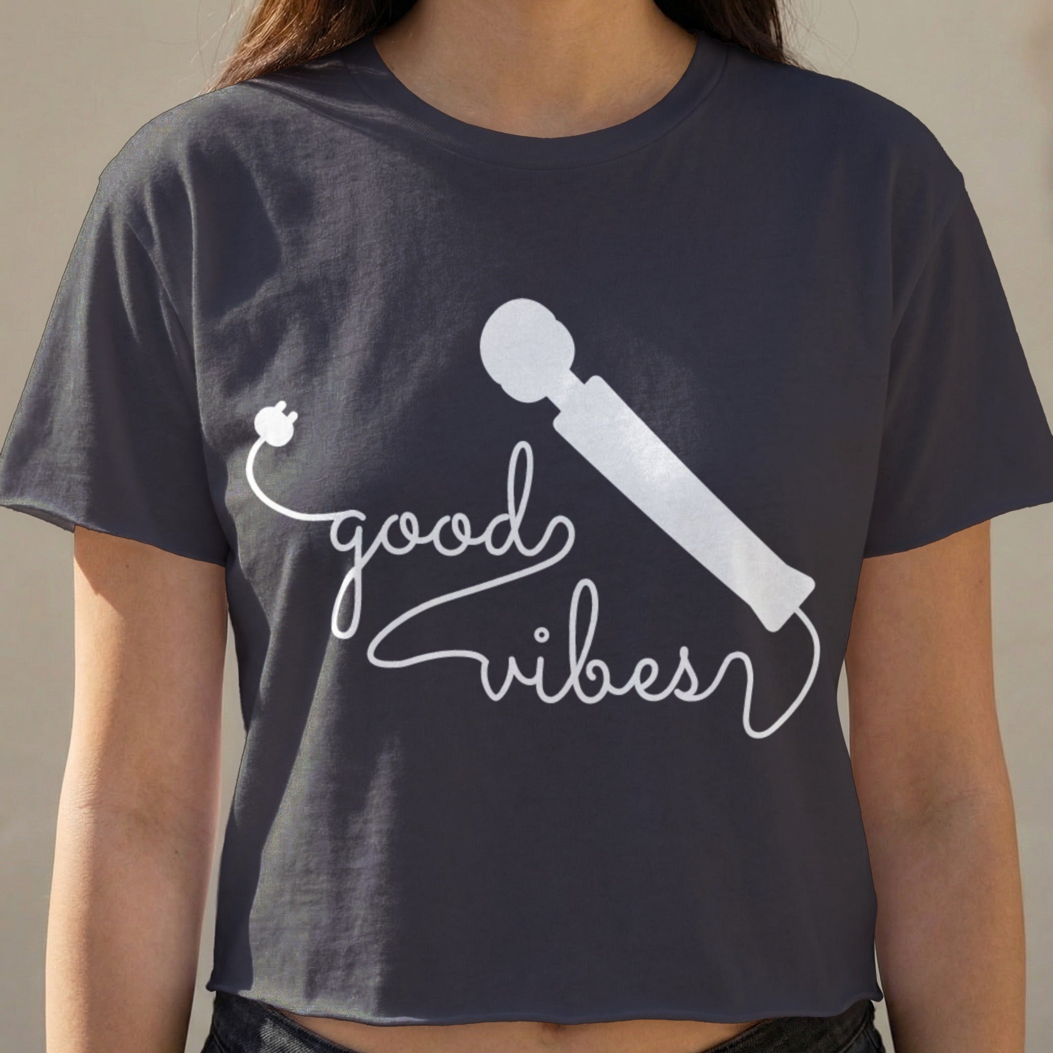 Dark grey t-shirt with "good vibes" text and a white wand silhouette.