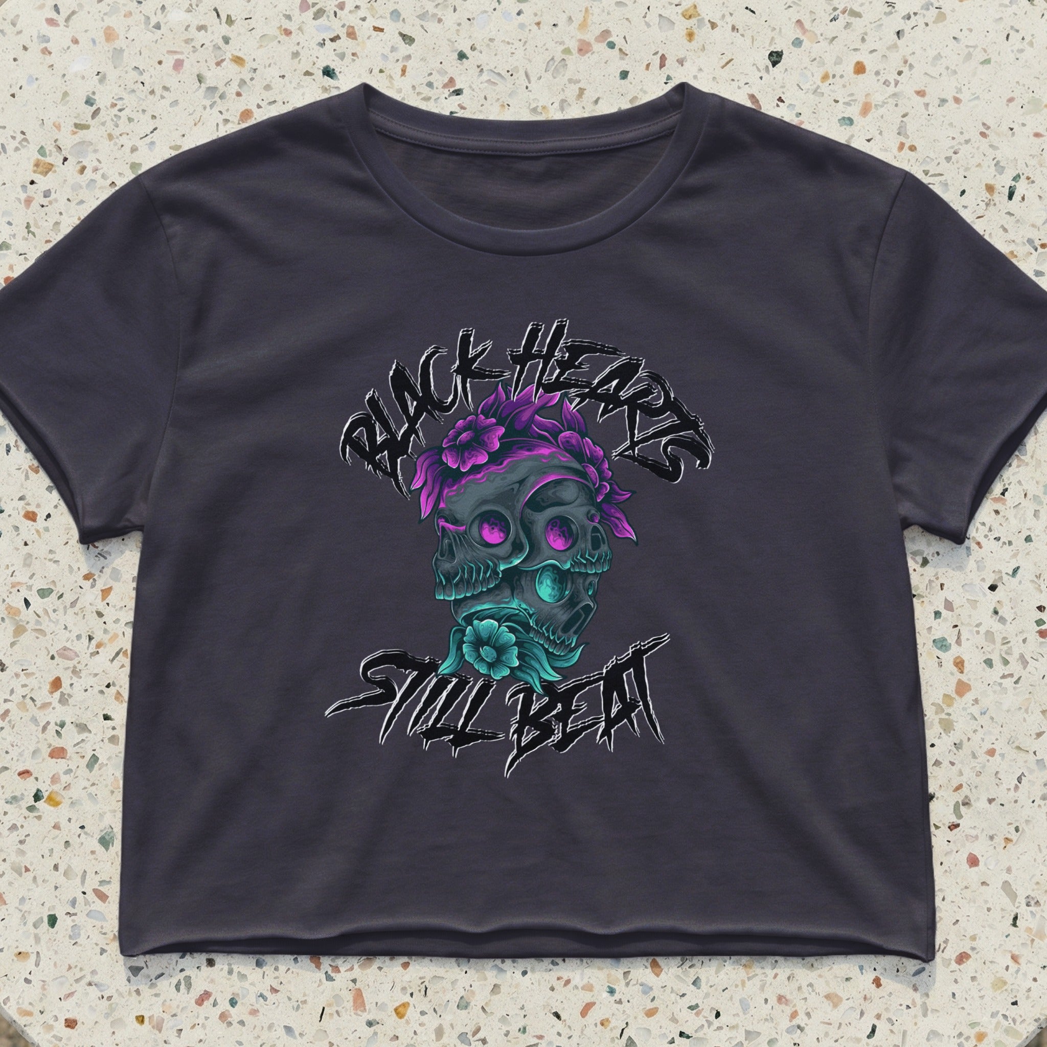 Black Hearts Still Beat graphic on dark gray cropped t-shirt.