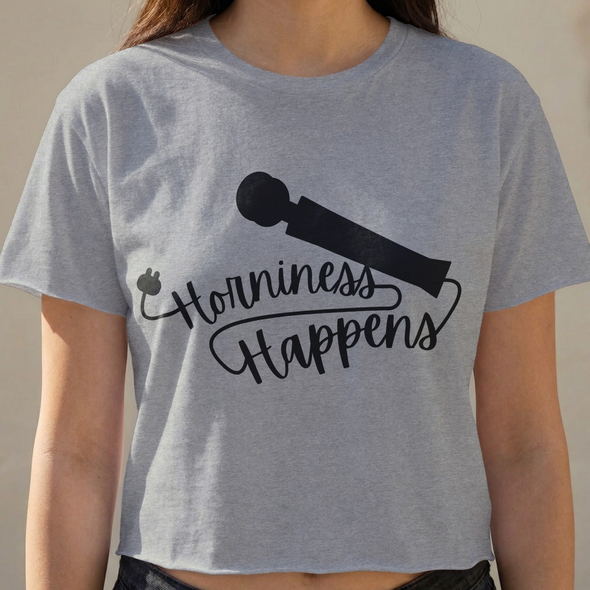 Gray crop top with "Horniness Happens" text and a stylized vibrator graphic.