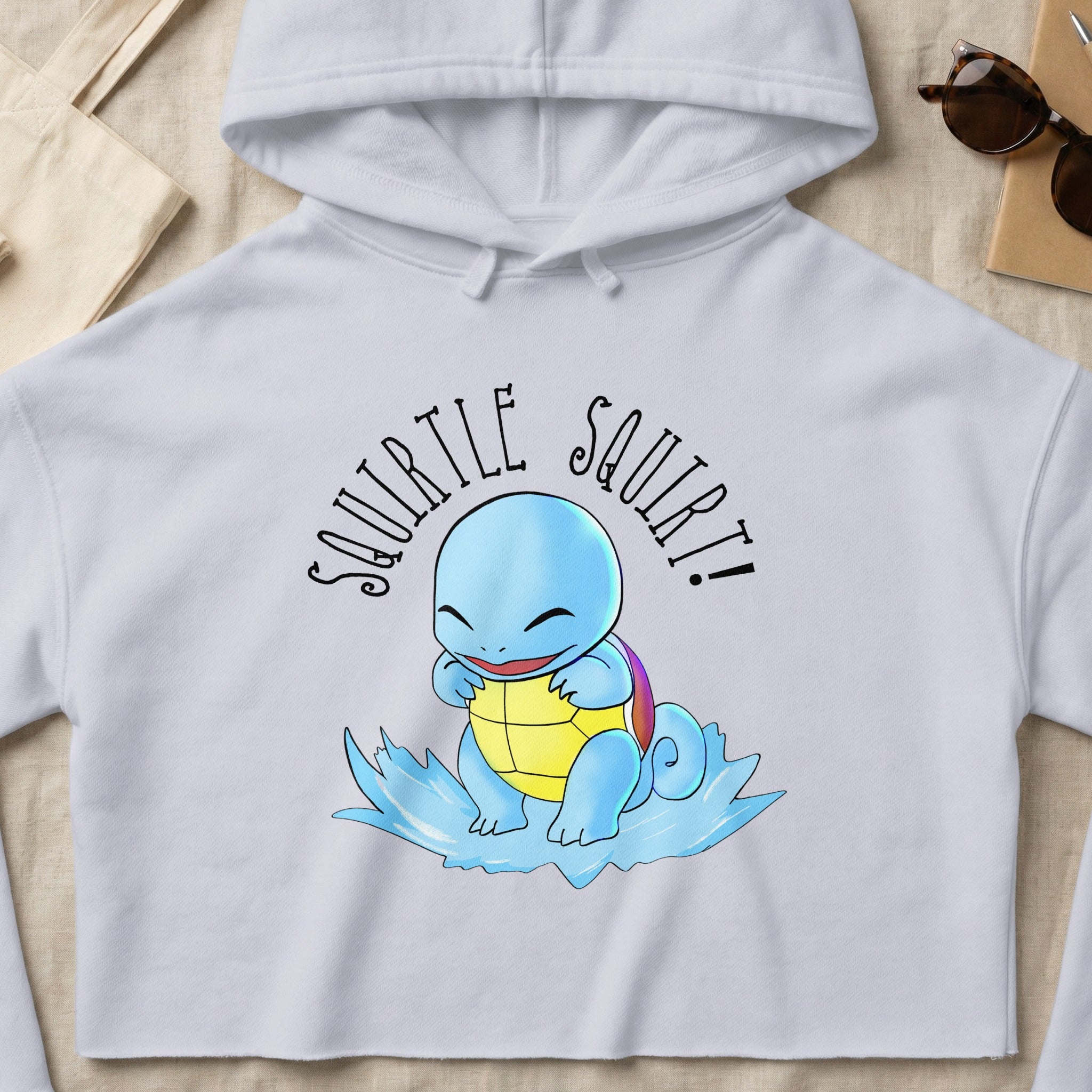 Squirtle on a water splash with "Squirtle Squirt!" text.