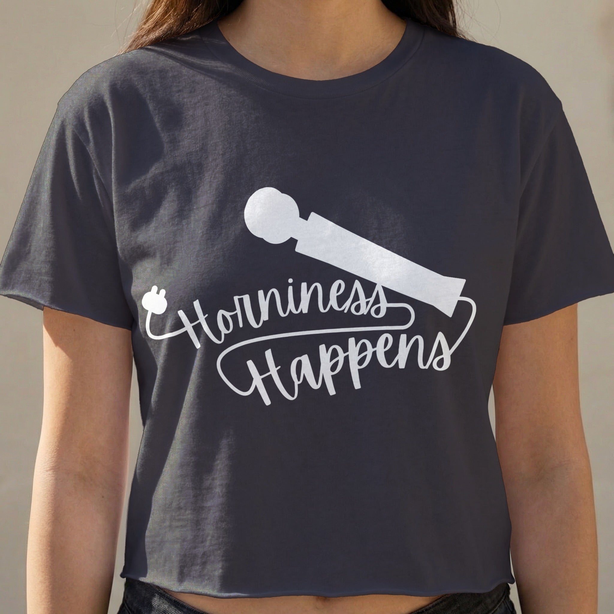 Dark t-shirt with "Horniness Happens" and vibrator graphic.