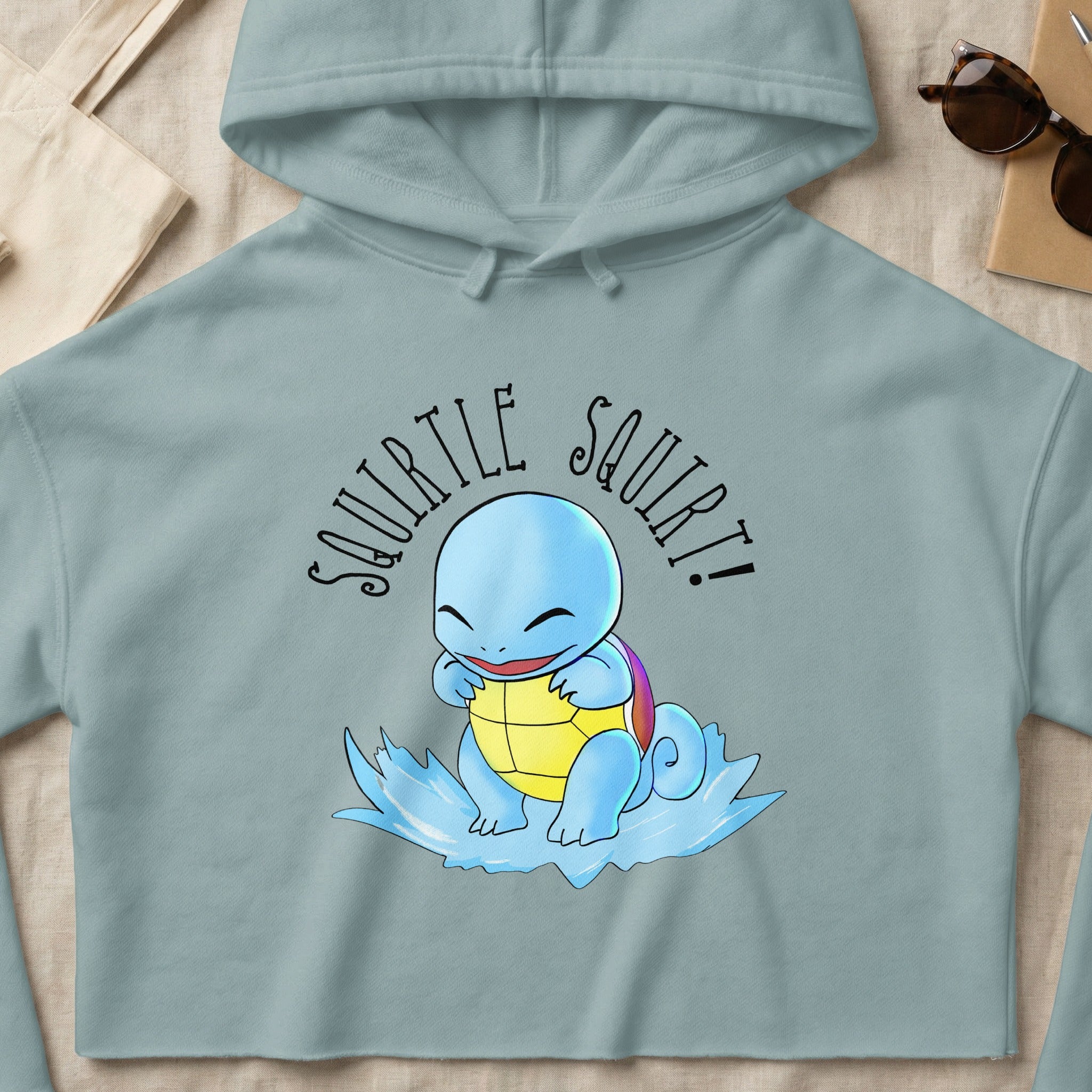 Squirtle with text "Squirtle Squirt!" on a blue splash.