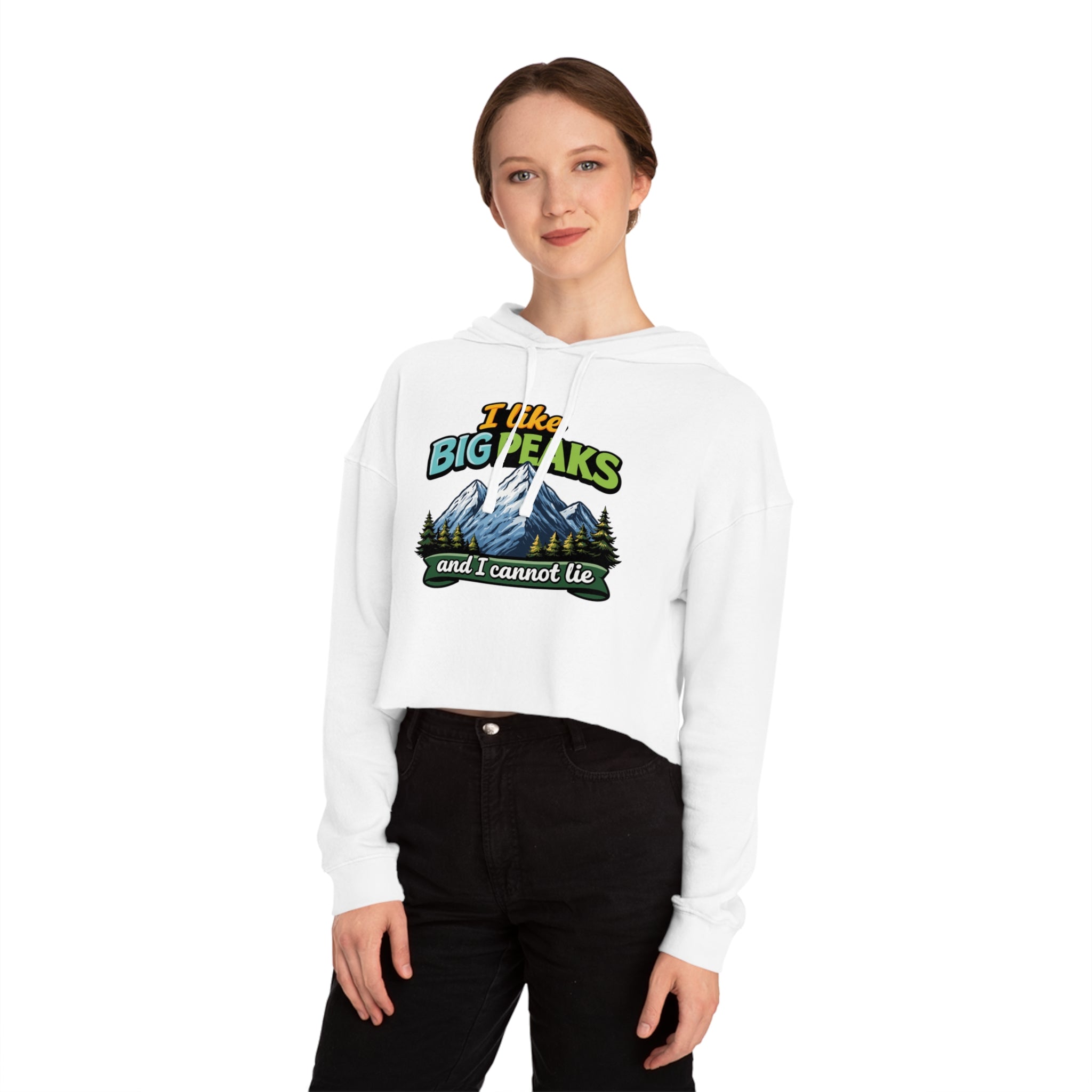 White cropped hoodie with mountains and trees graphic and text.