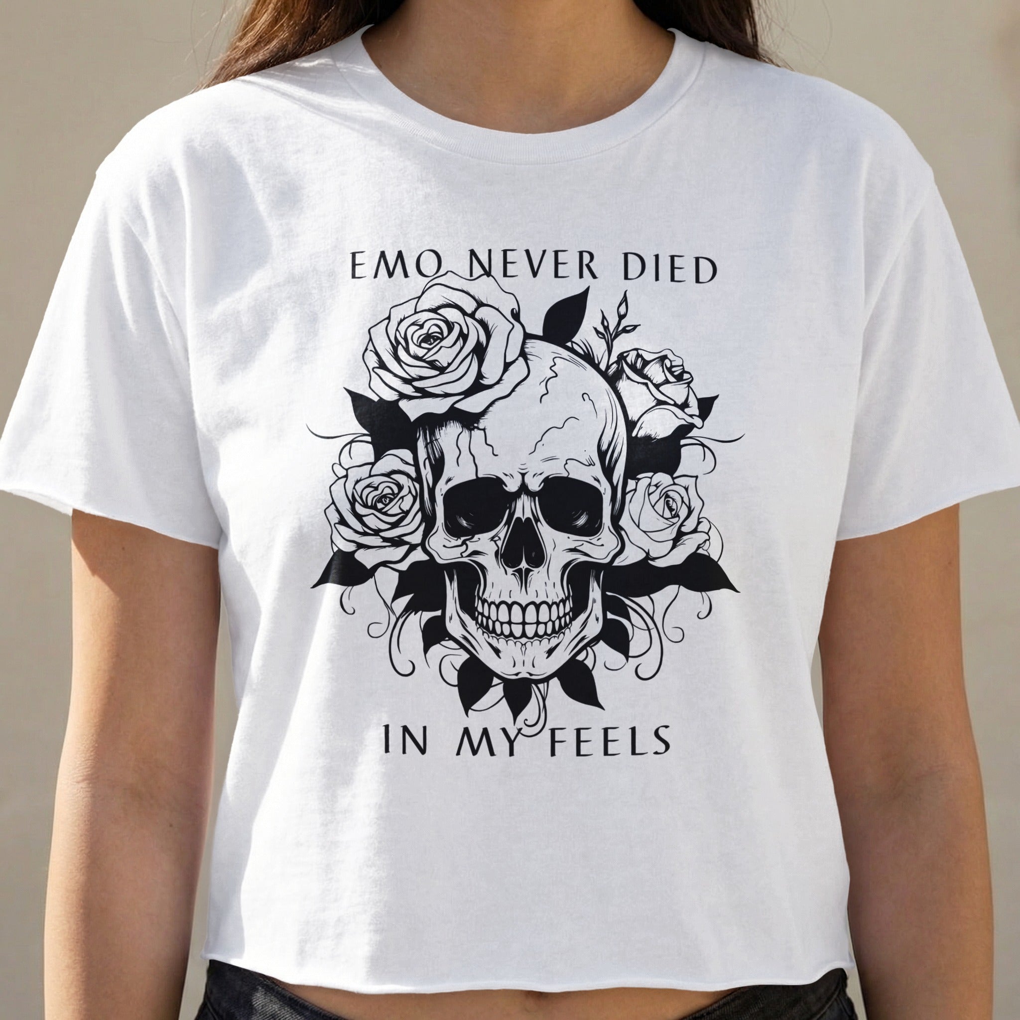 White t-shirt with skull and roses graphic and text "EMO NEVER DIED IN MY FEELS".
