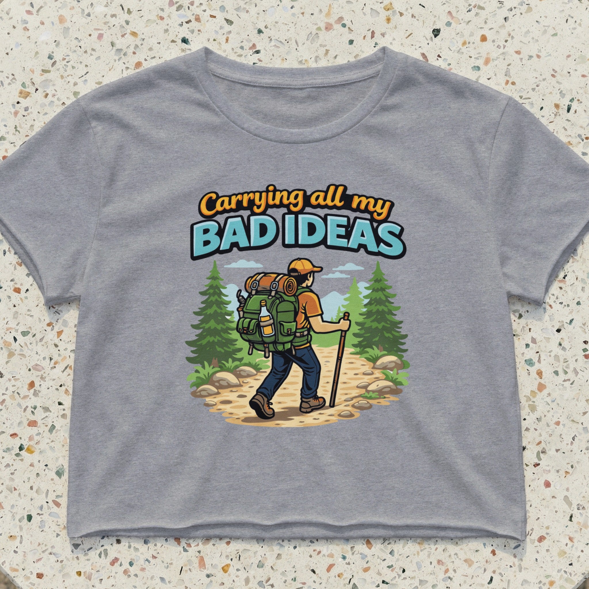 Man with backpack hiking, "Carrying all my BAD IDEAS" text.