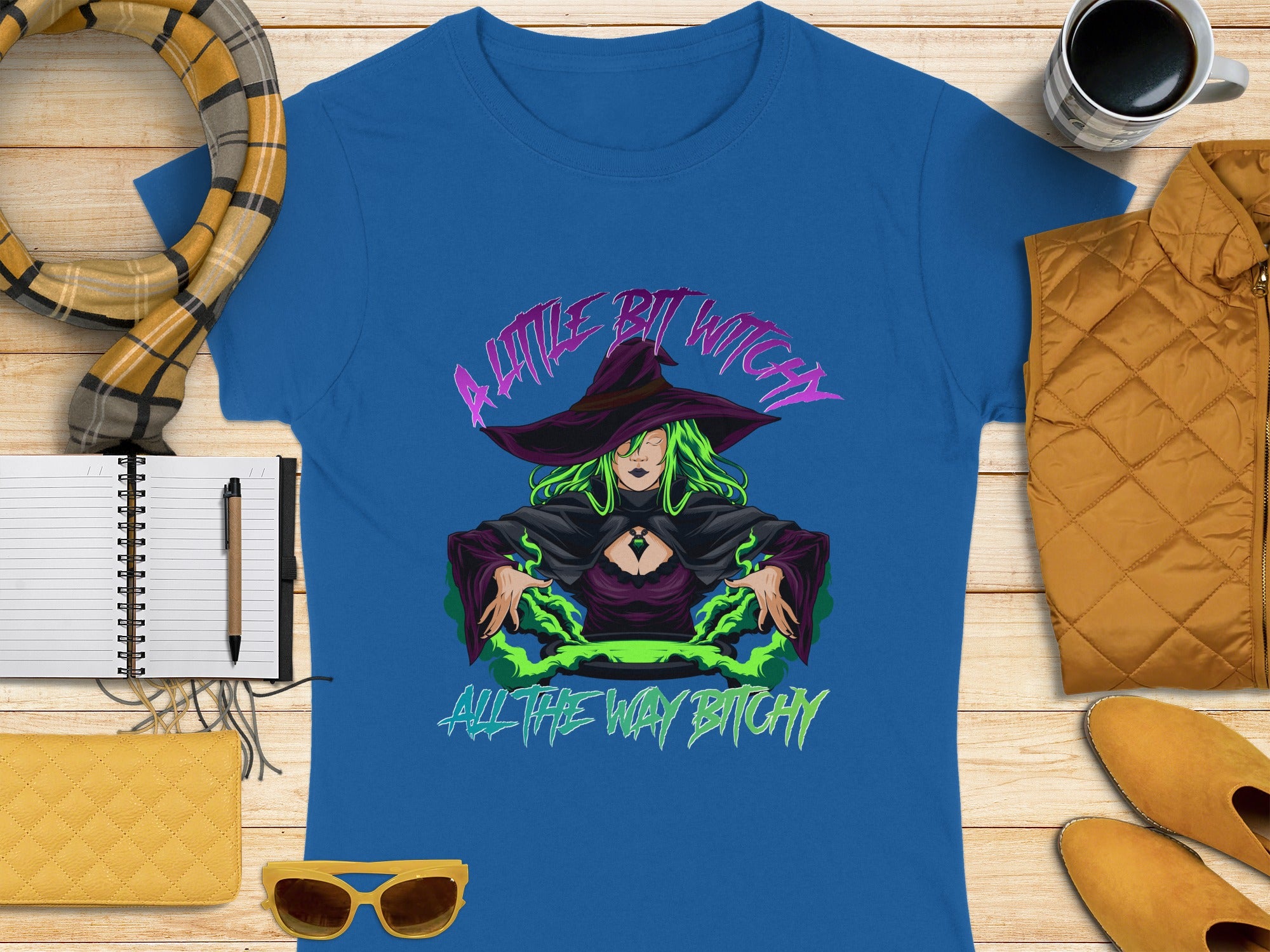 Graphic tee with witch illustration and text "A little bit witchy, all the way bitchy".