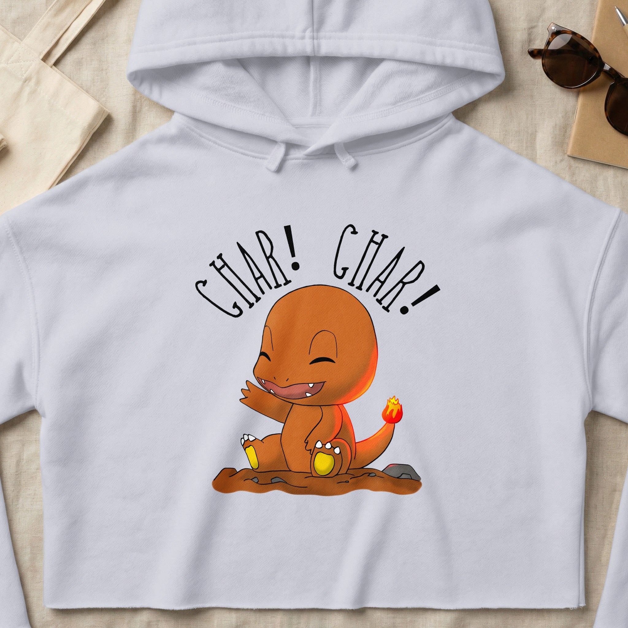 Charmander hoodie with "CHAR! CHAR!" text.