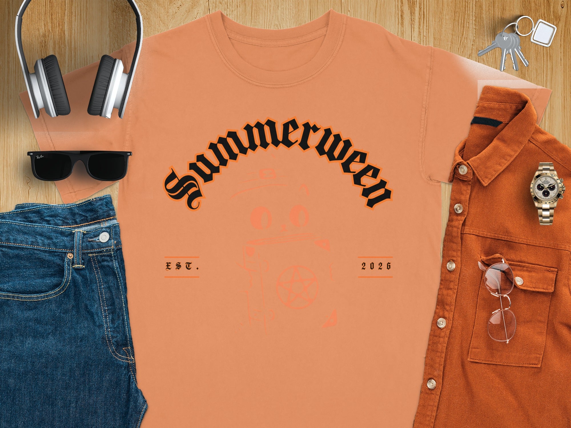 Orange t-shirt with "Summerween EST. 2026" and a cat graphic.