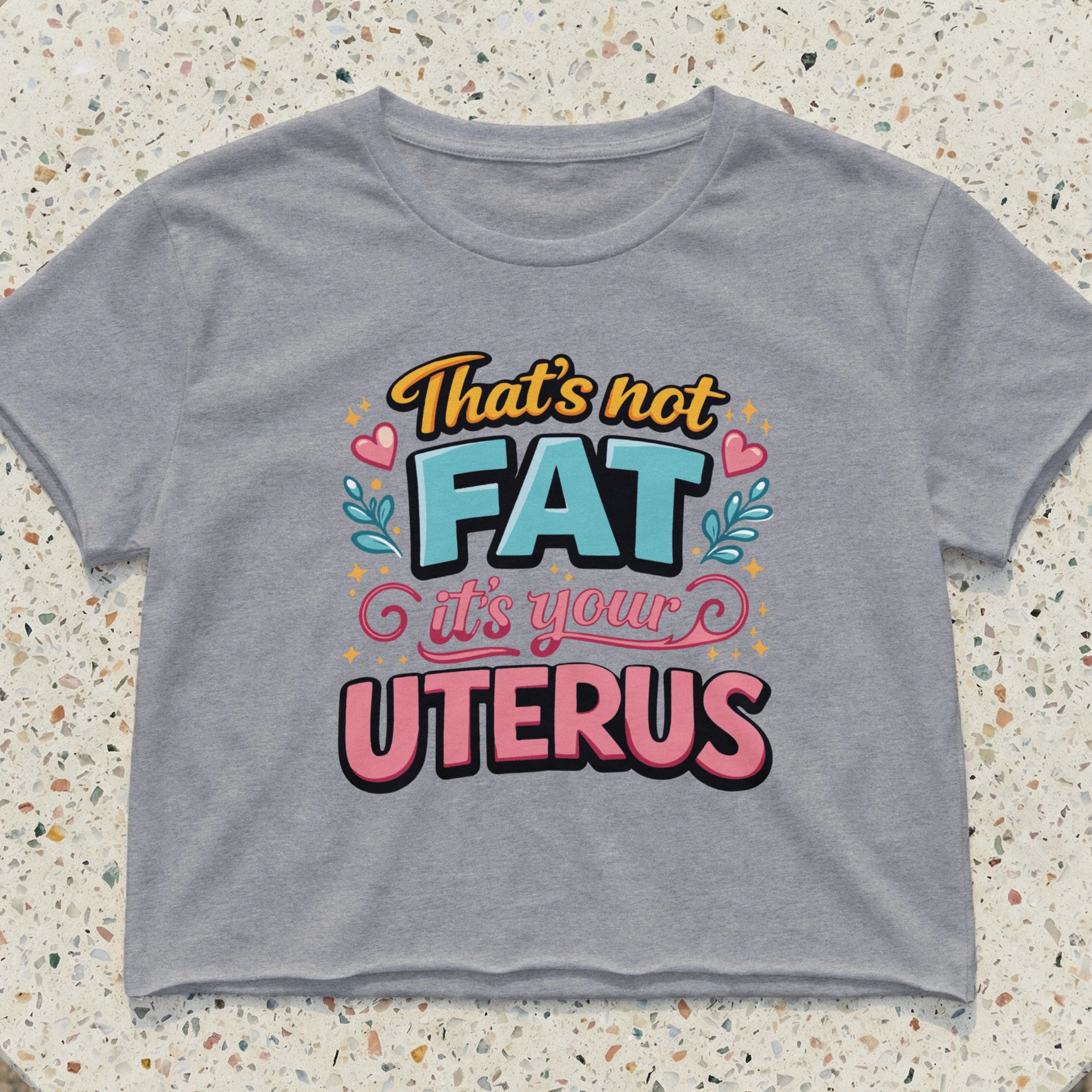 Grey cropped t-shirt with "That's not FAT it's your UTERUS" text.