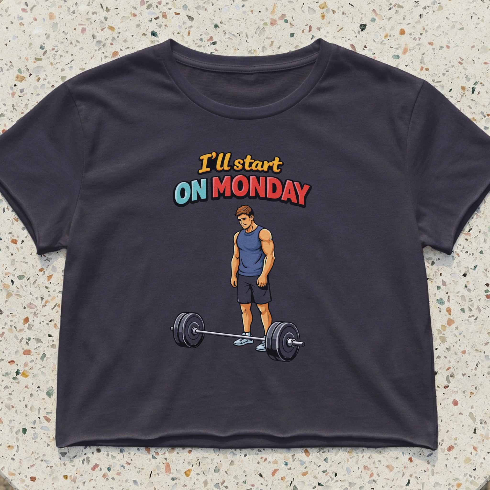 Dark t-shirt with text "I'll start ON MONDAY" and a man with a barbell.