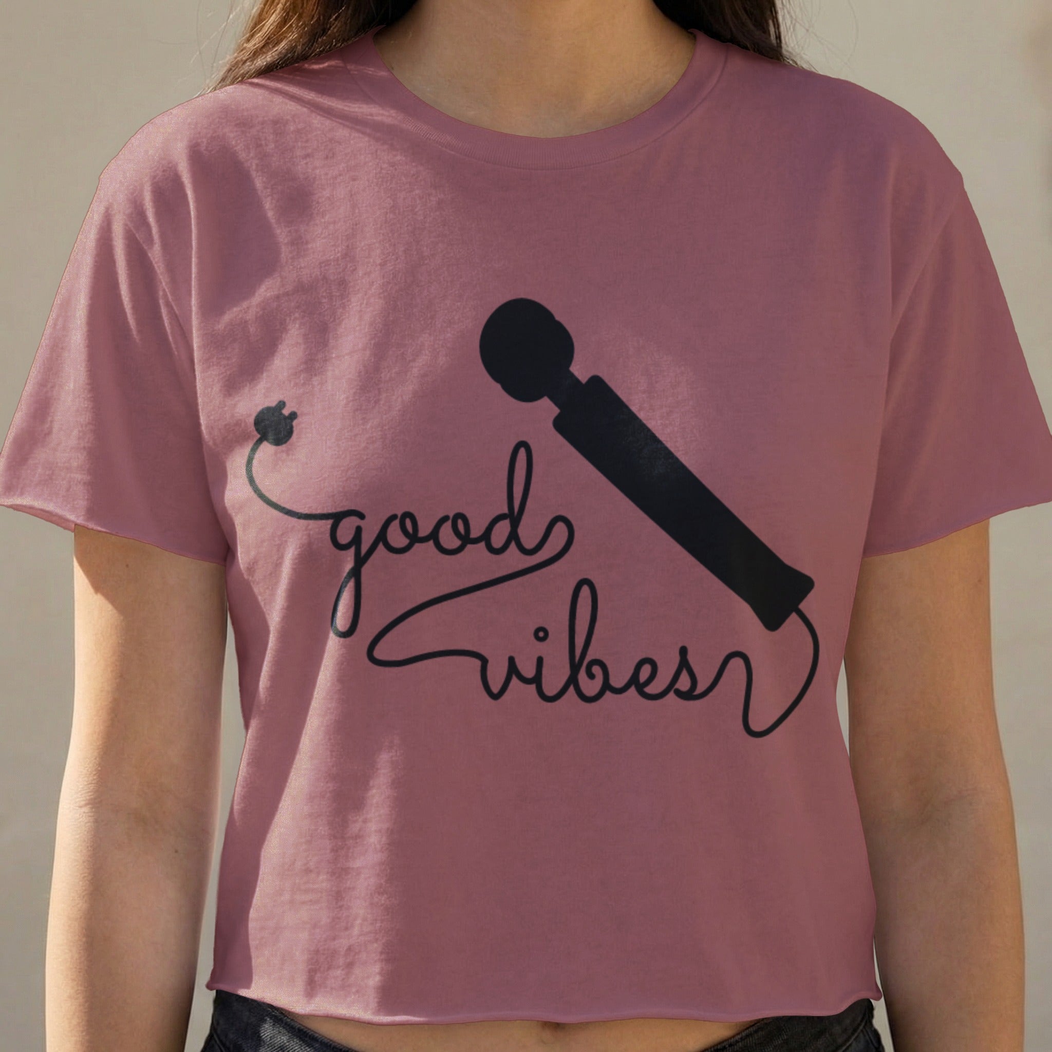 Cropped mauve t-shirt with "good vibes" text and a vibrator graphic.