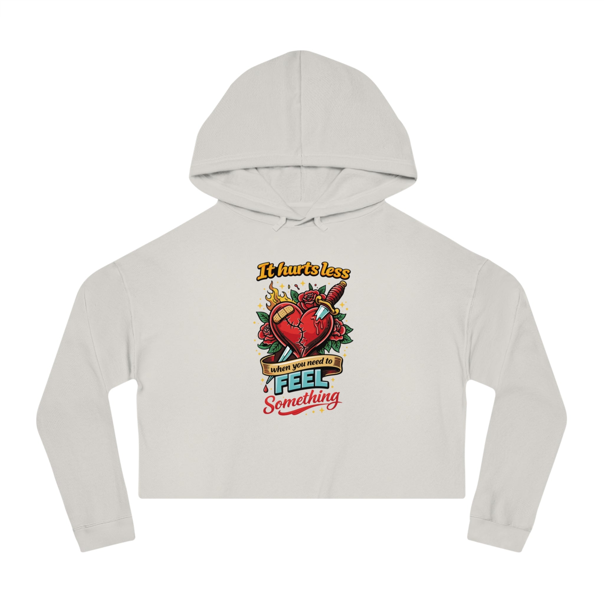 Cream cropped hoodie with a vintage tattoo-style graphic of a bleeding heart and knife.